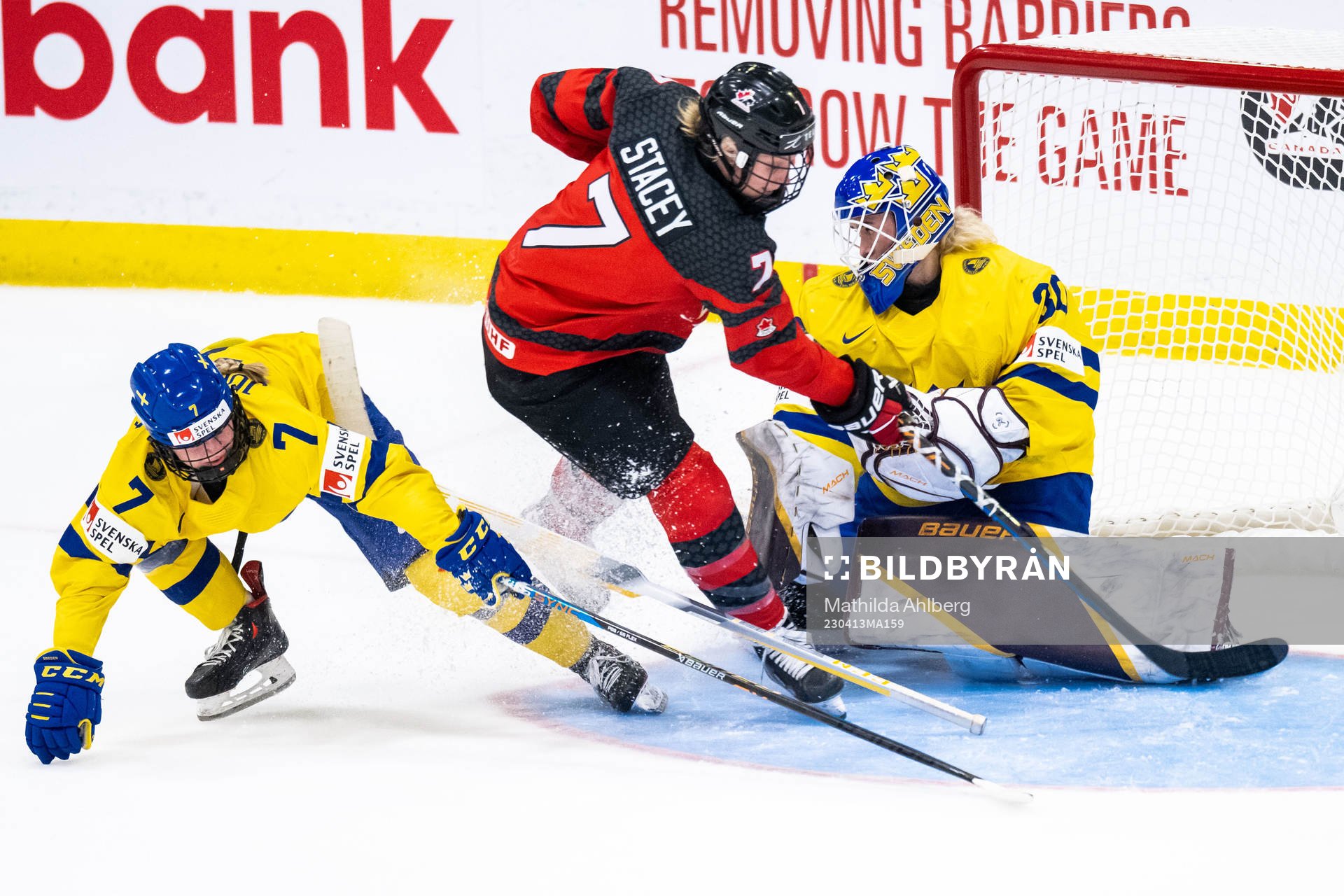 Mira Jungåker and goaltender Emma Söderberg of Sweden and