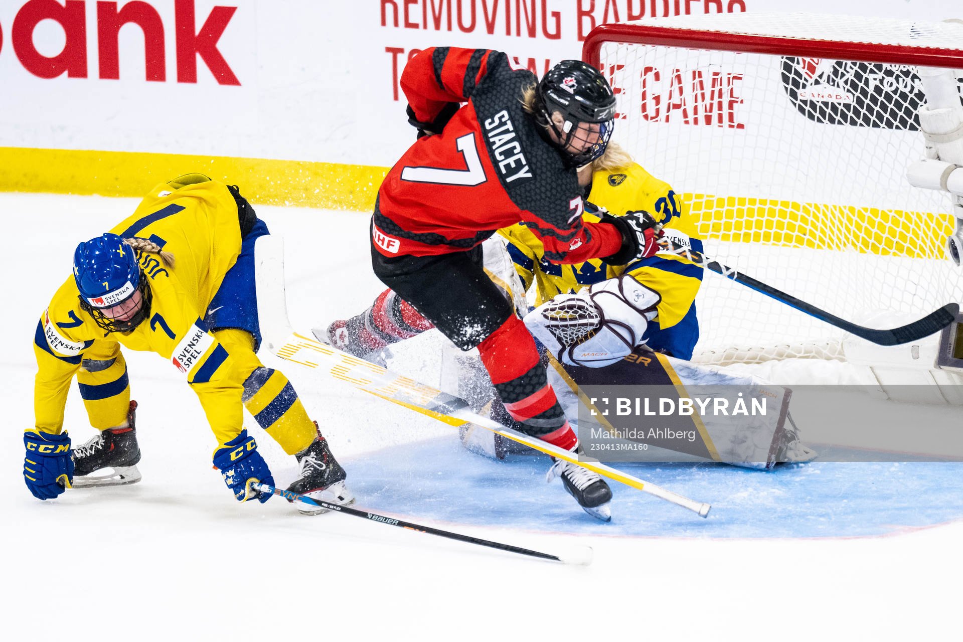 Mira Jungåker and goaltender Emma Söderberg of Sweden and