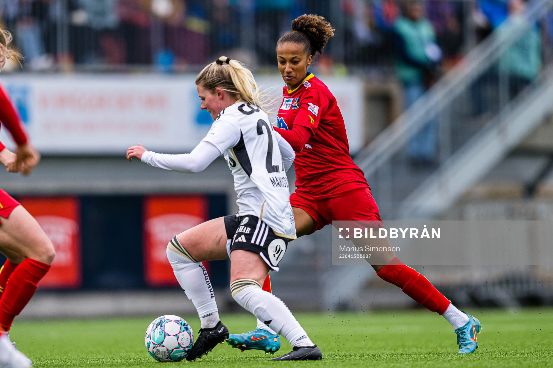 Selma Sol Magnusdottir of Rosenborg and Cassandra Ella Archontoulis Bogere of Røa during the Toppserien football match between Rosenborg and Røa on April 15, 2023 in Trondheim.