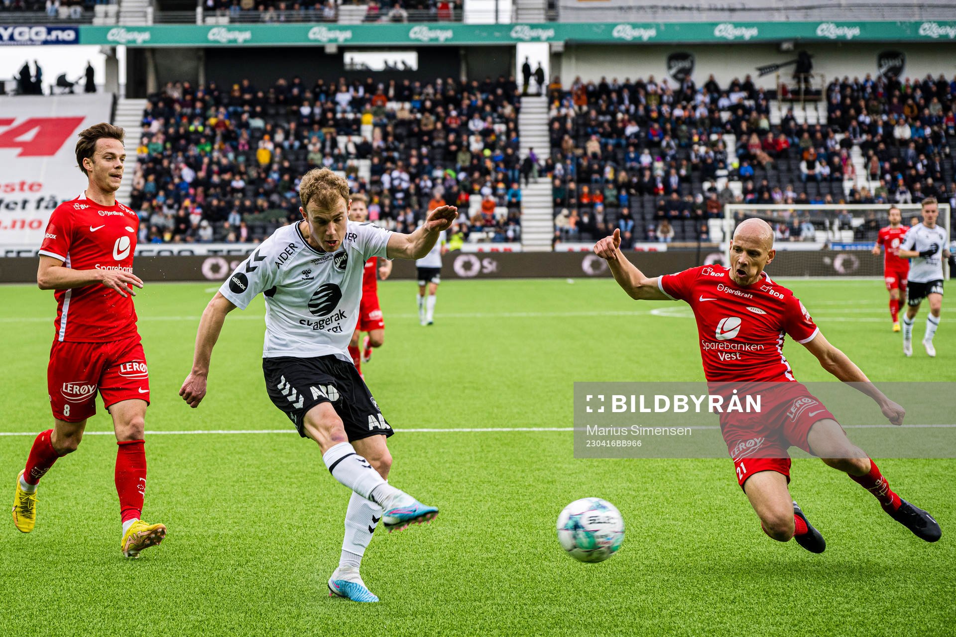 Dennis Gjengaar of Odd and Ruben Kristiansen of Brann