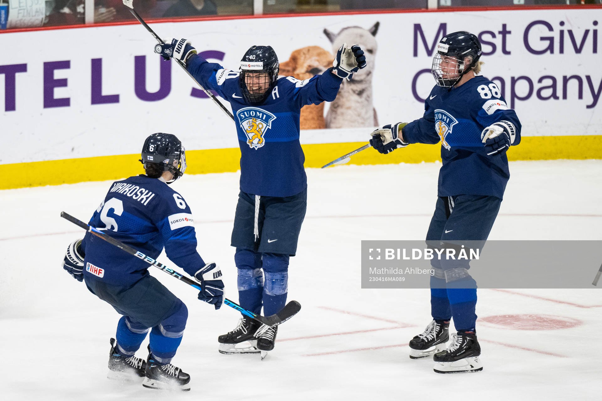 Jenni Hiirikoski and Ronja Savolainen celebrate with Noora