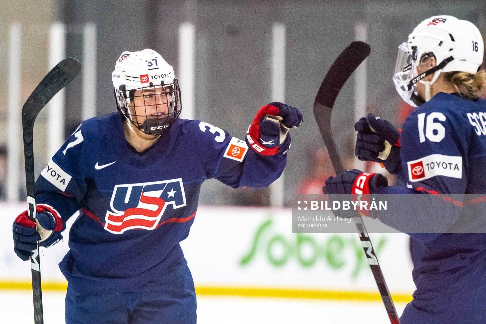 Abbey Murphy of USA celebrates scoring 1-1