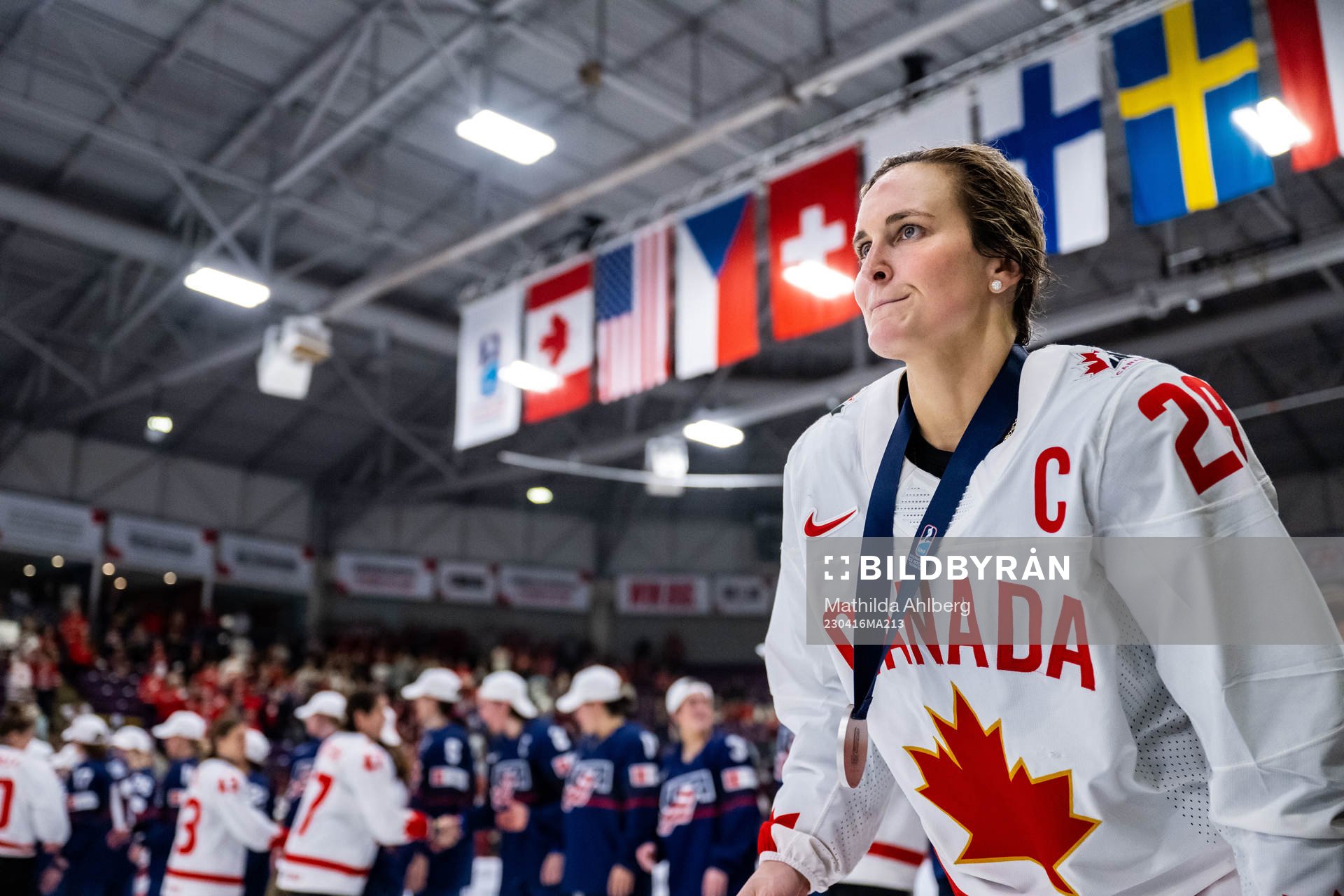 Marie-Philip Poulin of Canada looks dejected