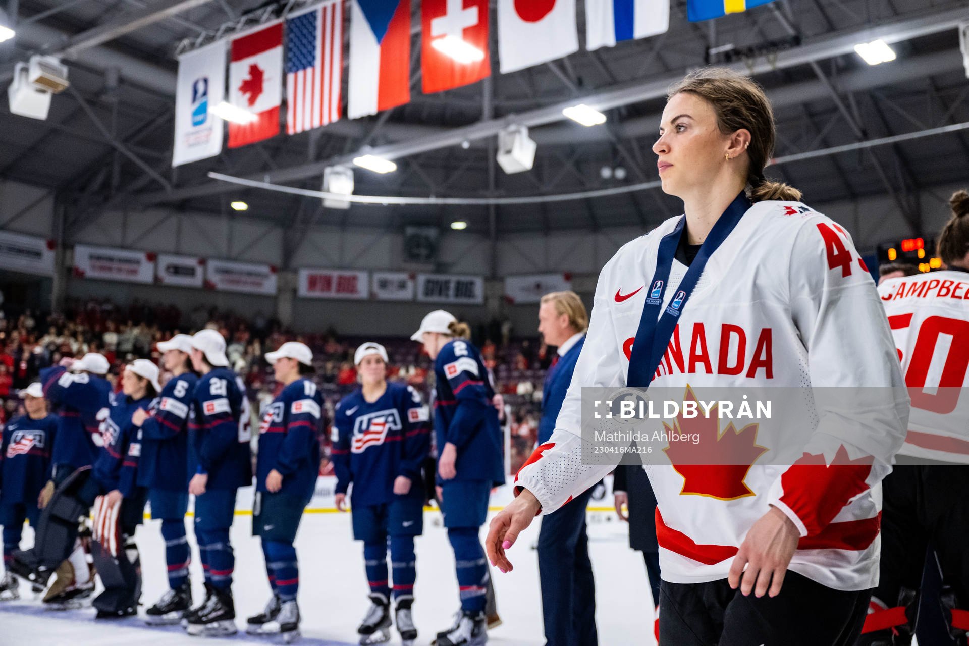 Kristin Oneill of Canada looks dejected