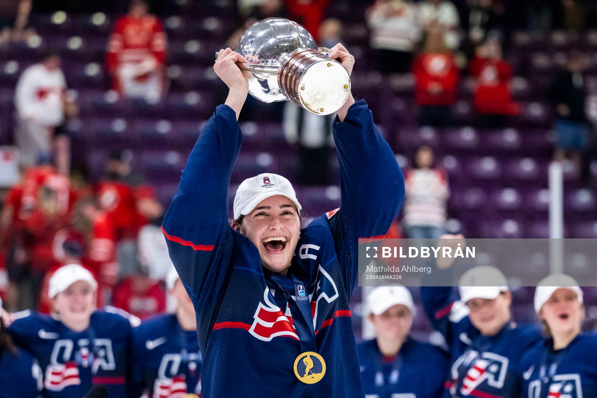 Alex Carpenter of USA celebrate winning the 2023 IIHF