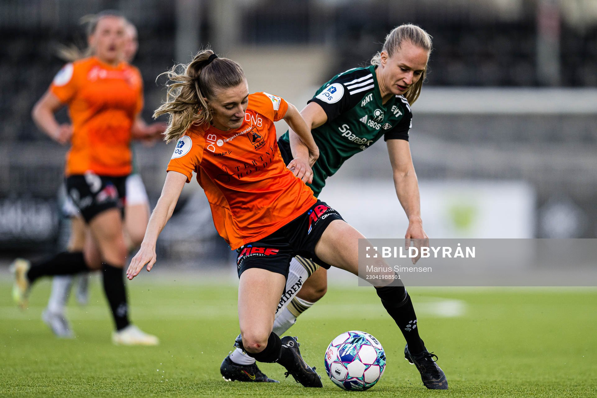 Nina Vestbøstad of Åsane and Maria Olsvik of Rosenborg during the Toppserien football match between Åsane and Rosenborg on April 19, 2023 in Bergen.