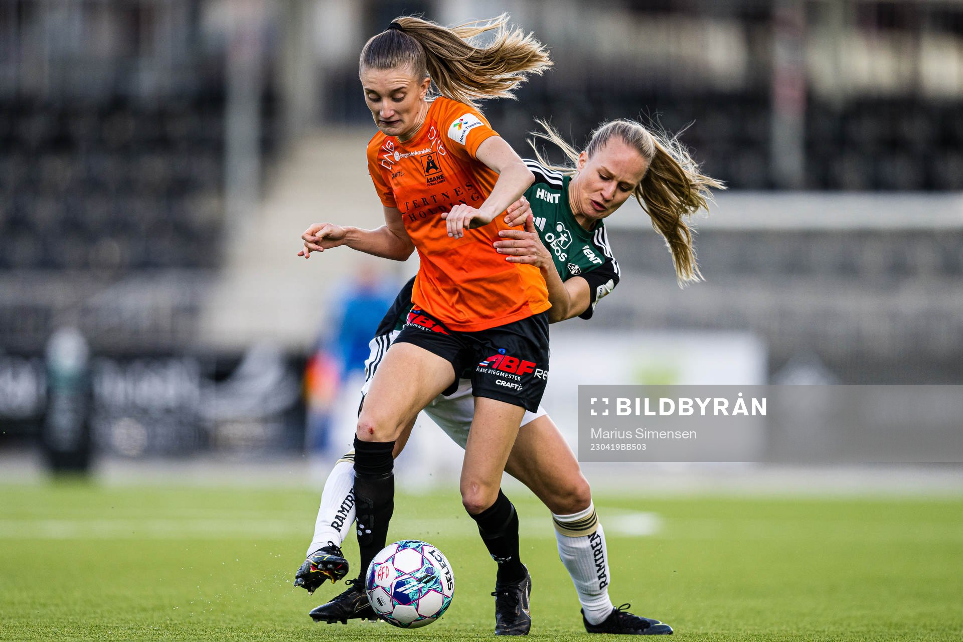 Nina Vestbøstad of Åsane and Maria Olsvik of Rosenborg during the Toppserien football match between Åsane and Rosenborg on April 19, 2023 in Bergen.