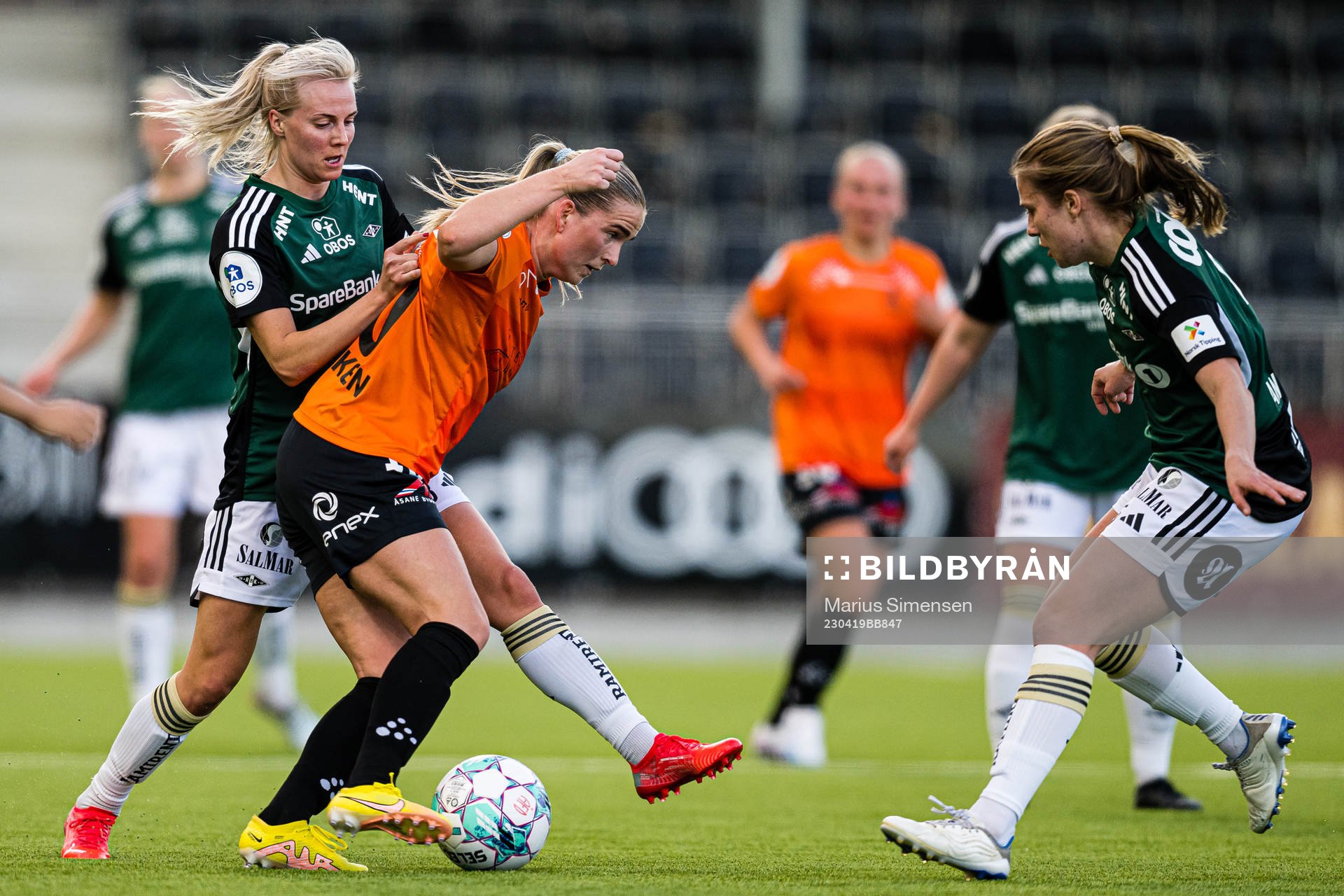 Mali Lilleås Næss of Rosenborg and Ida Skaar Kroken of Åsane during the Toppserien football match between Åsane and Rosenborg on April 19, 2023 in Bergen.