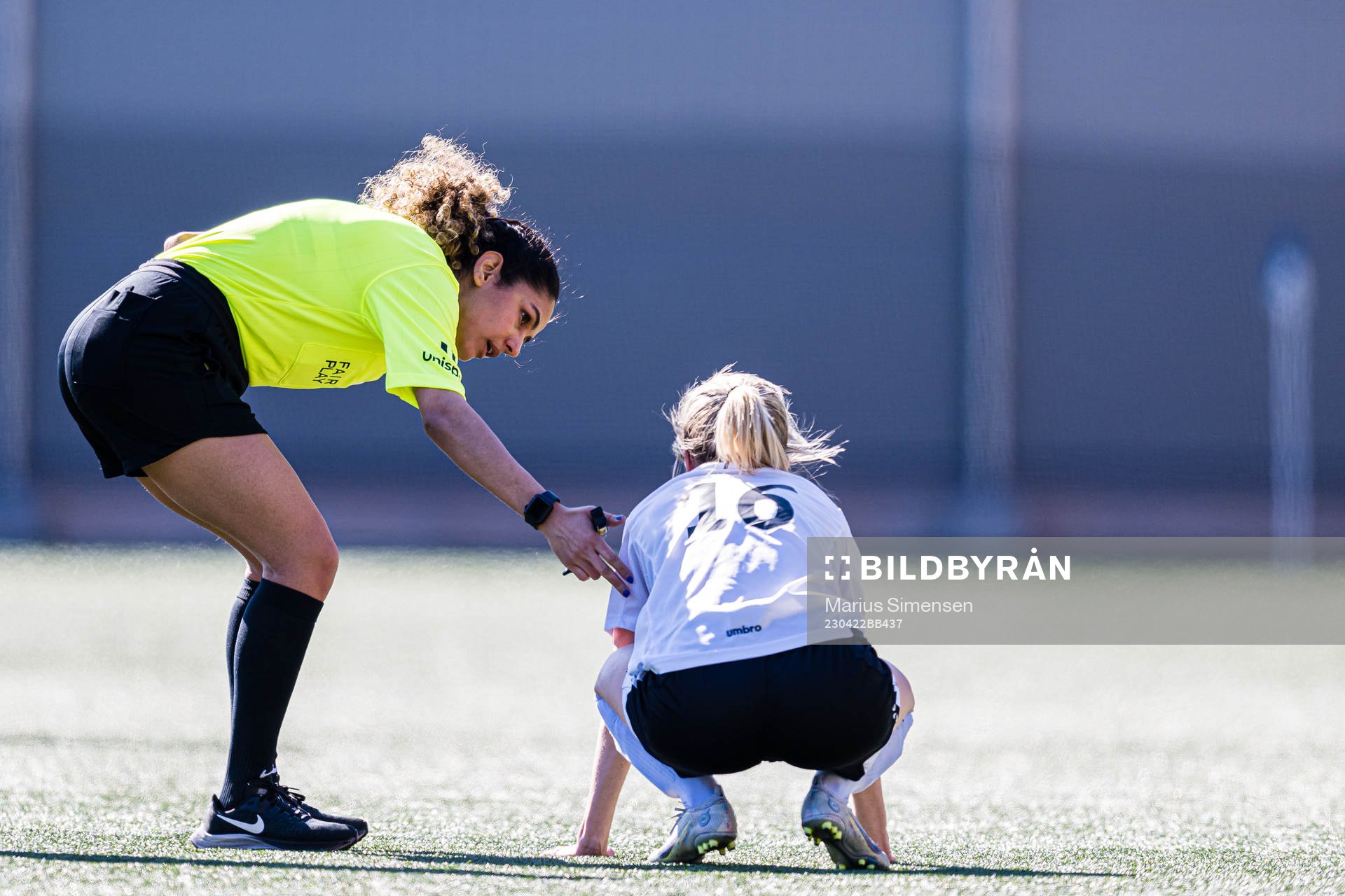Maliha Ahmady, referee, and Lina Osland Forthun of Fyllingsdalen during the 1. division football match between Grei and Fyllingsdalen on April 22, 2023 in Oslo.