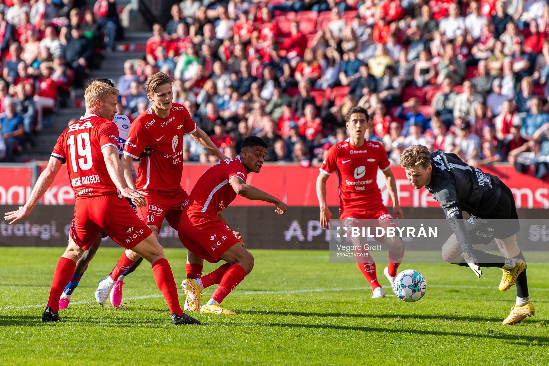 Japhet Sery Larsen and goalkeeper Mathias Dyngeland of