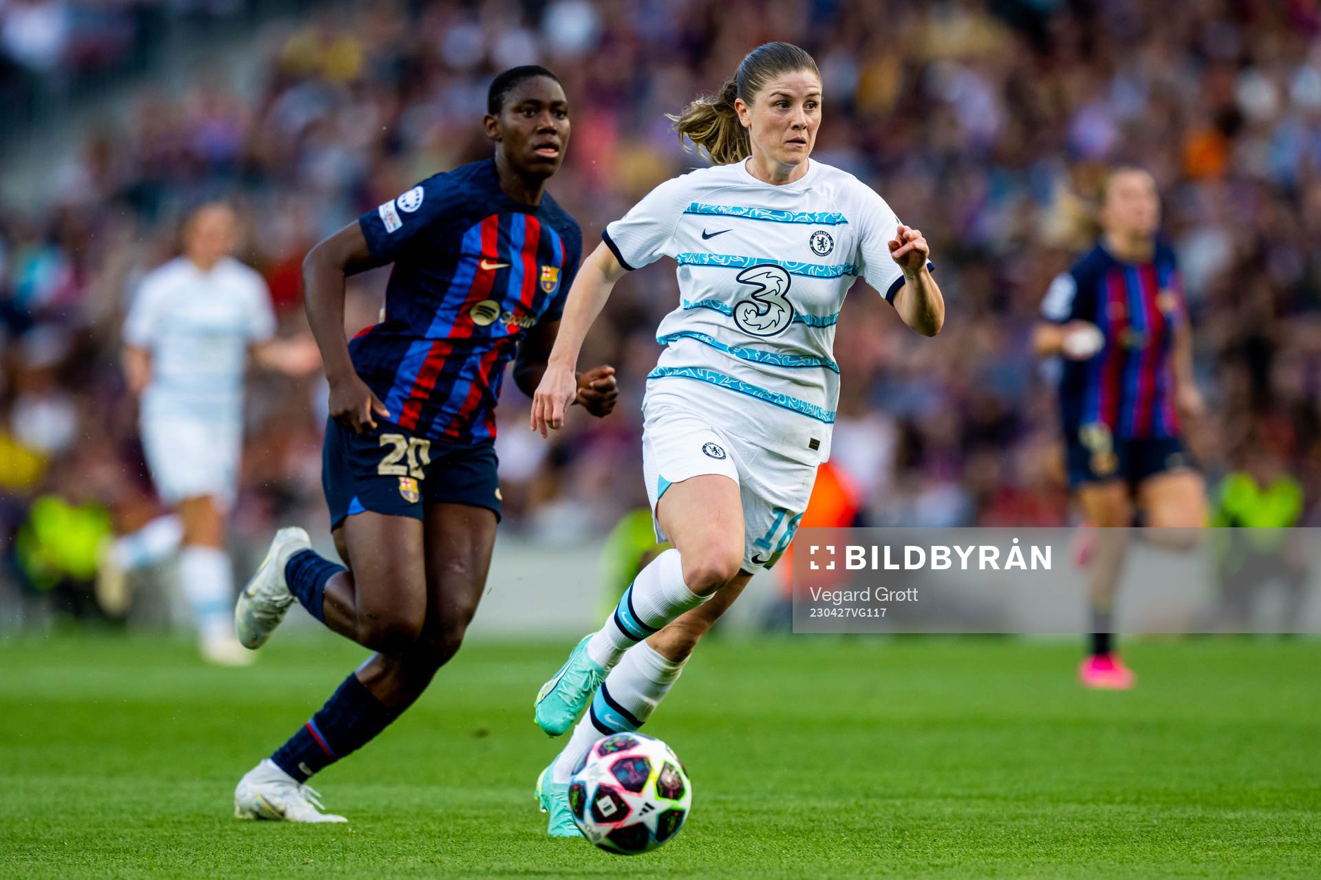 Asisat Oshoala of Barcelona and Maren Mjelde of Chelsea