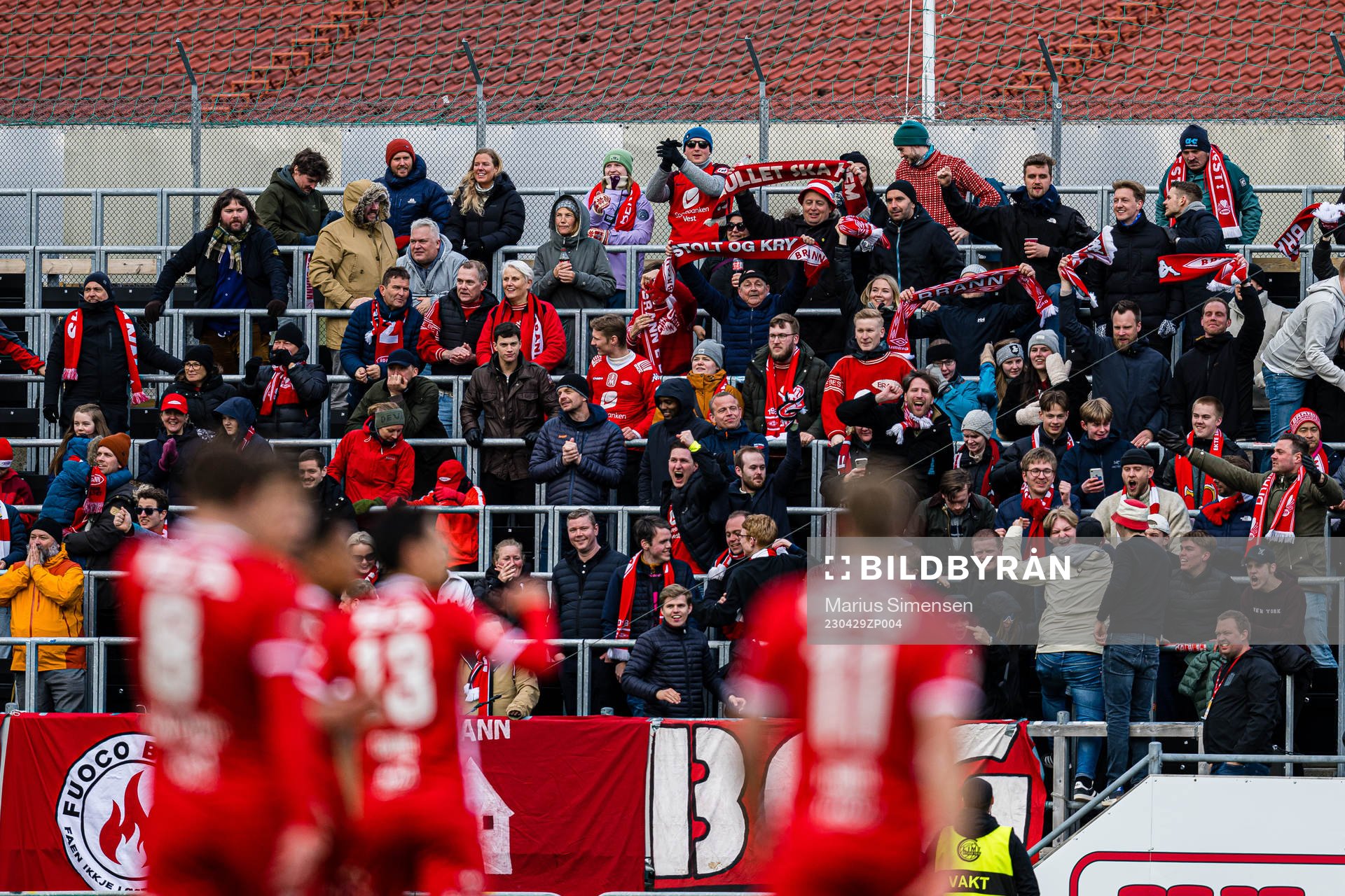 Spectators in the stands celebrates