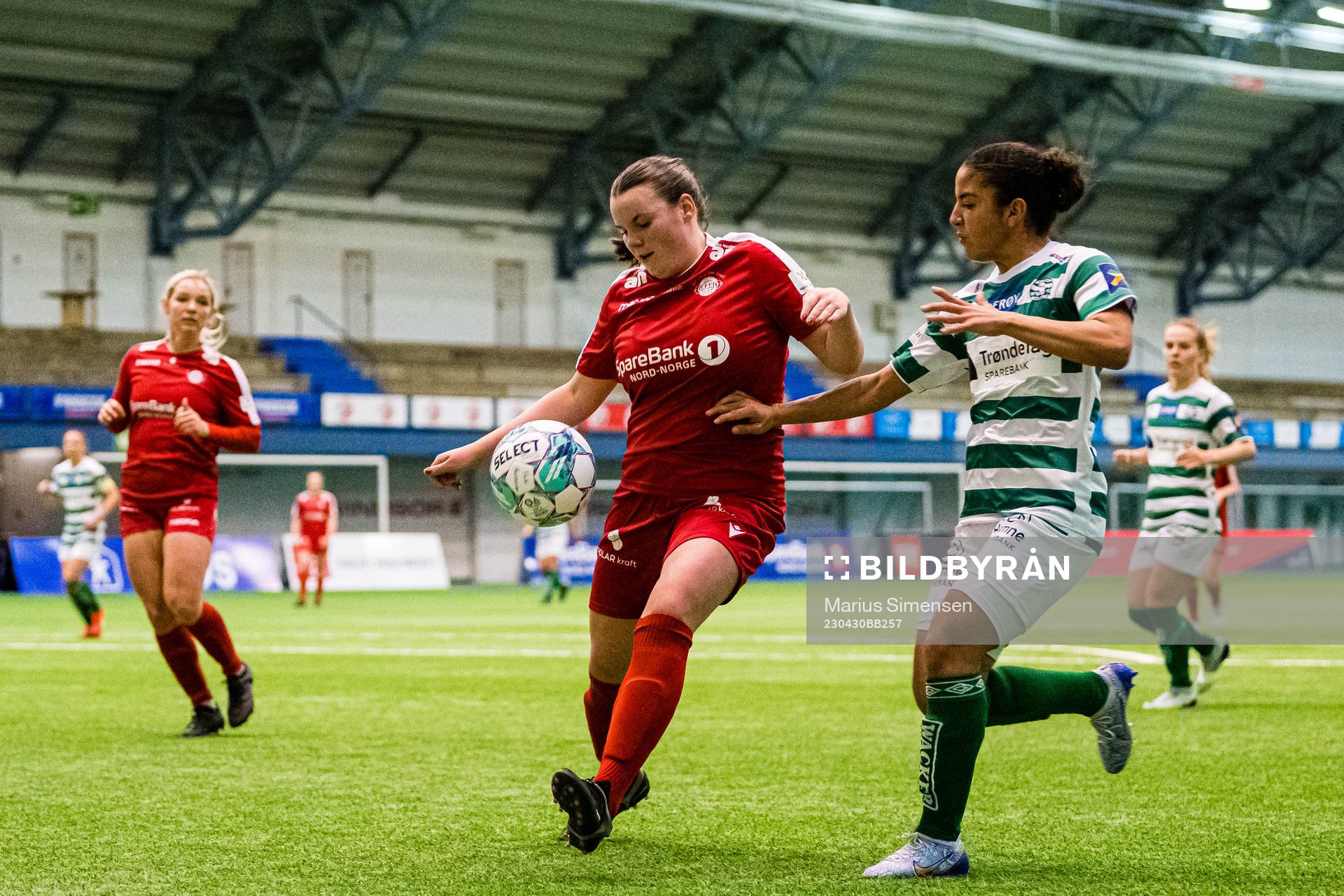 Tuva Angellsen Reiertsen of Grand Bodø and Anfal el Yamani Haida of KIL/Hemne during the 1. division football match between Grand Bodø and KIL/Hemne on April 30, 2023 in Bodø.