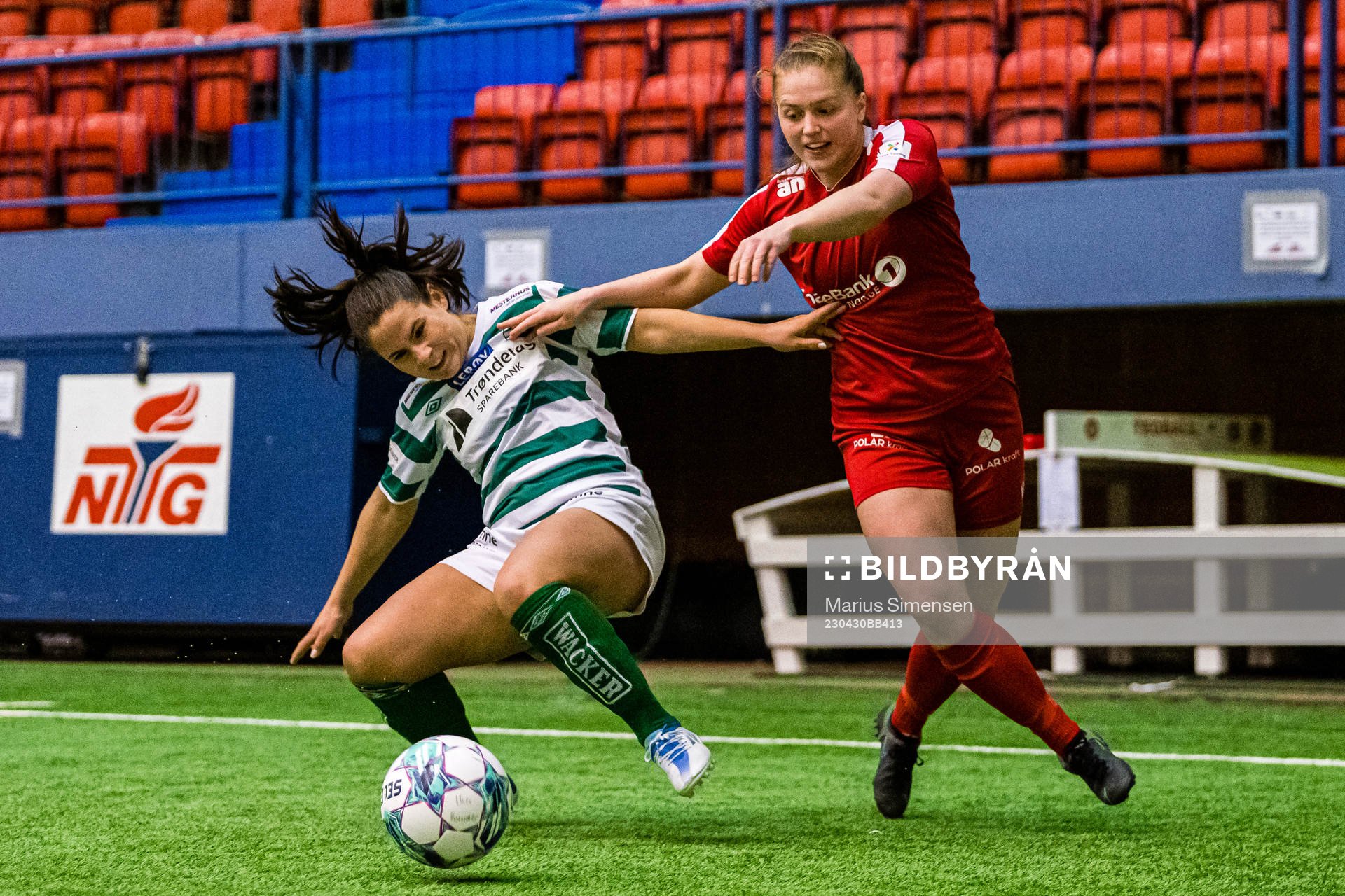Marita Olsen of KIL/Hemne and Kristina Borgenhaug Brudvik of Grand Bodø during the 1. division football match between Grand Bodø and KIL/Hemne on April 30, 2023 in Bodø.