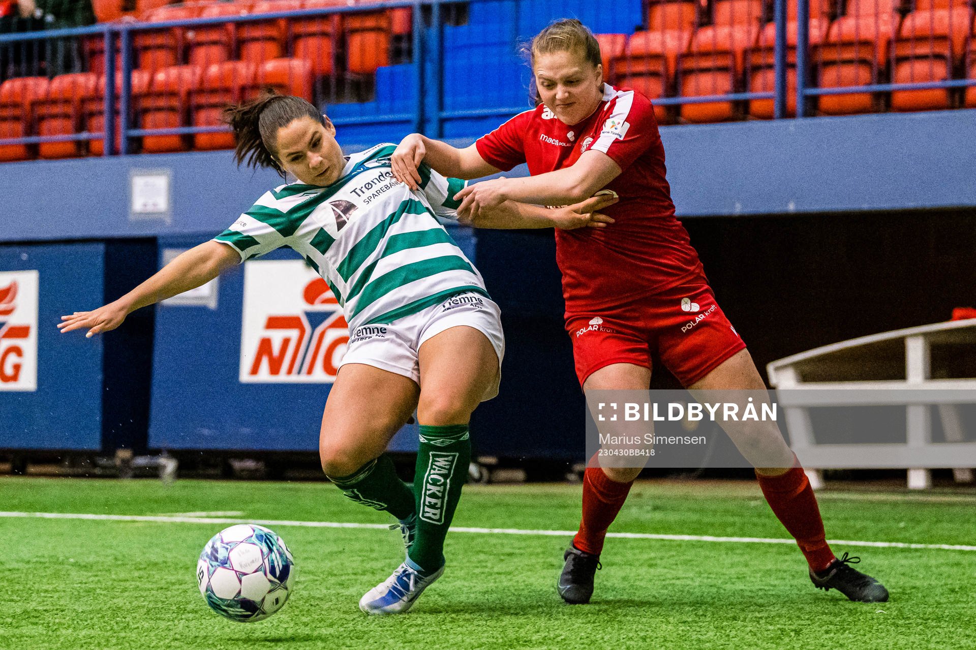 Marita Olsen of KIL/Hemne and Kristina Borgenhaug Brudvik of Grand Bodø during the 1. division football match between Grand Bodø and KIL/Hemne on April 30, 2023 in Bodø.