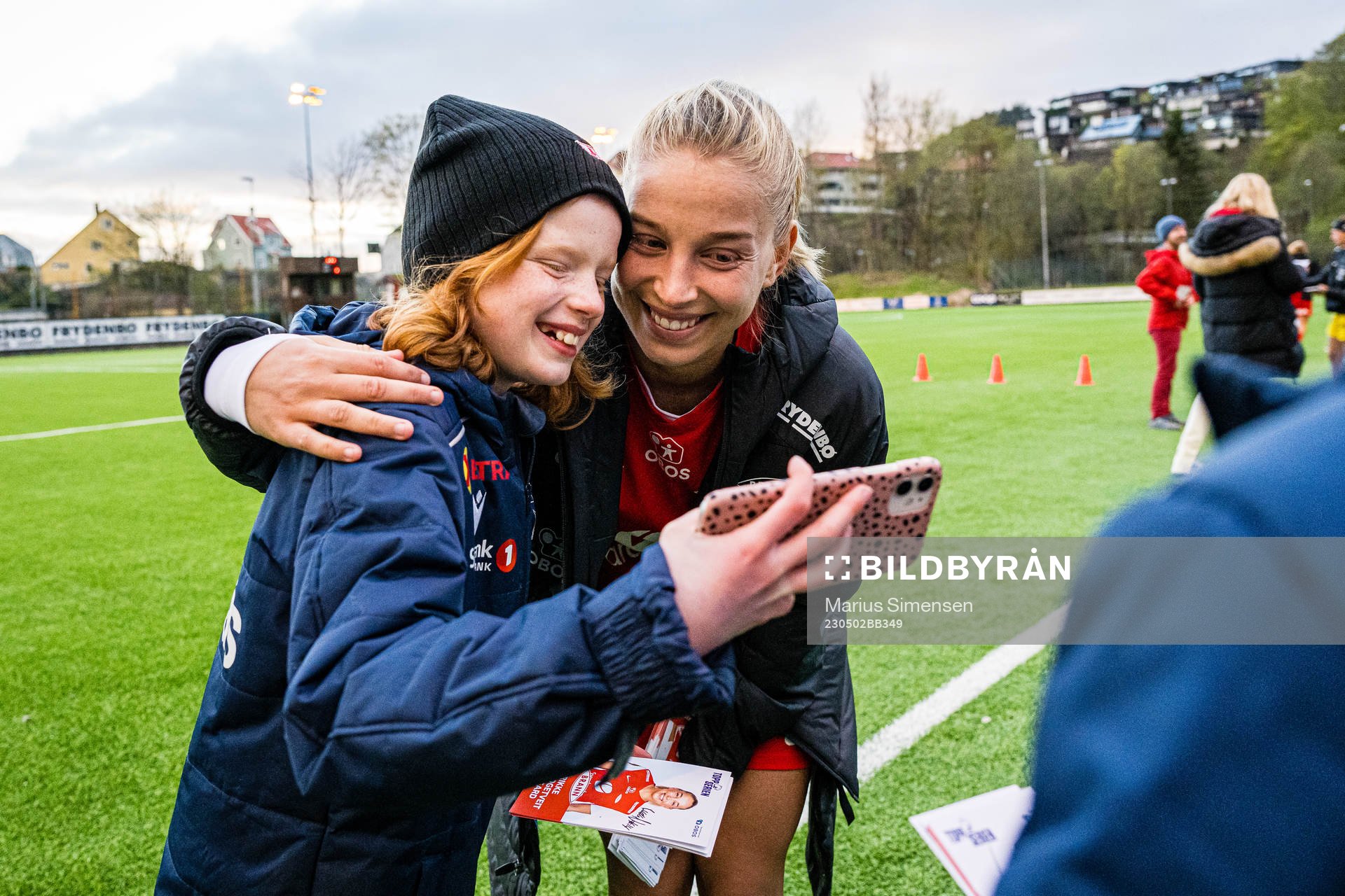 Rikke Bogetveit Nygard of Brann taking a selfie with a fan