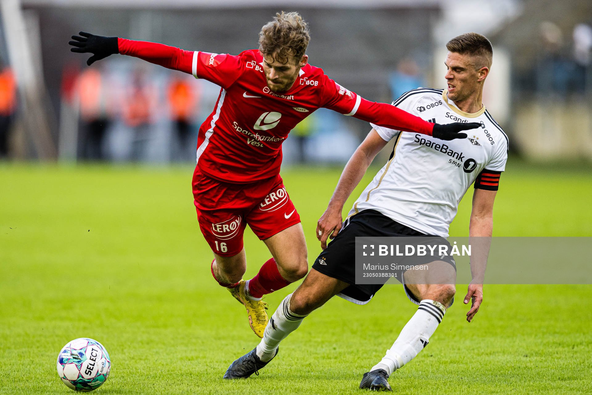Ole Didrik Blomberg of Brann and Markus Henriksen of