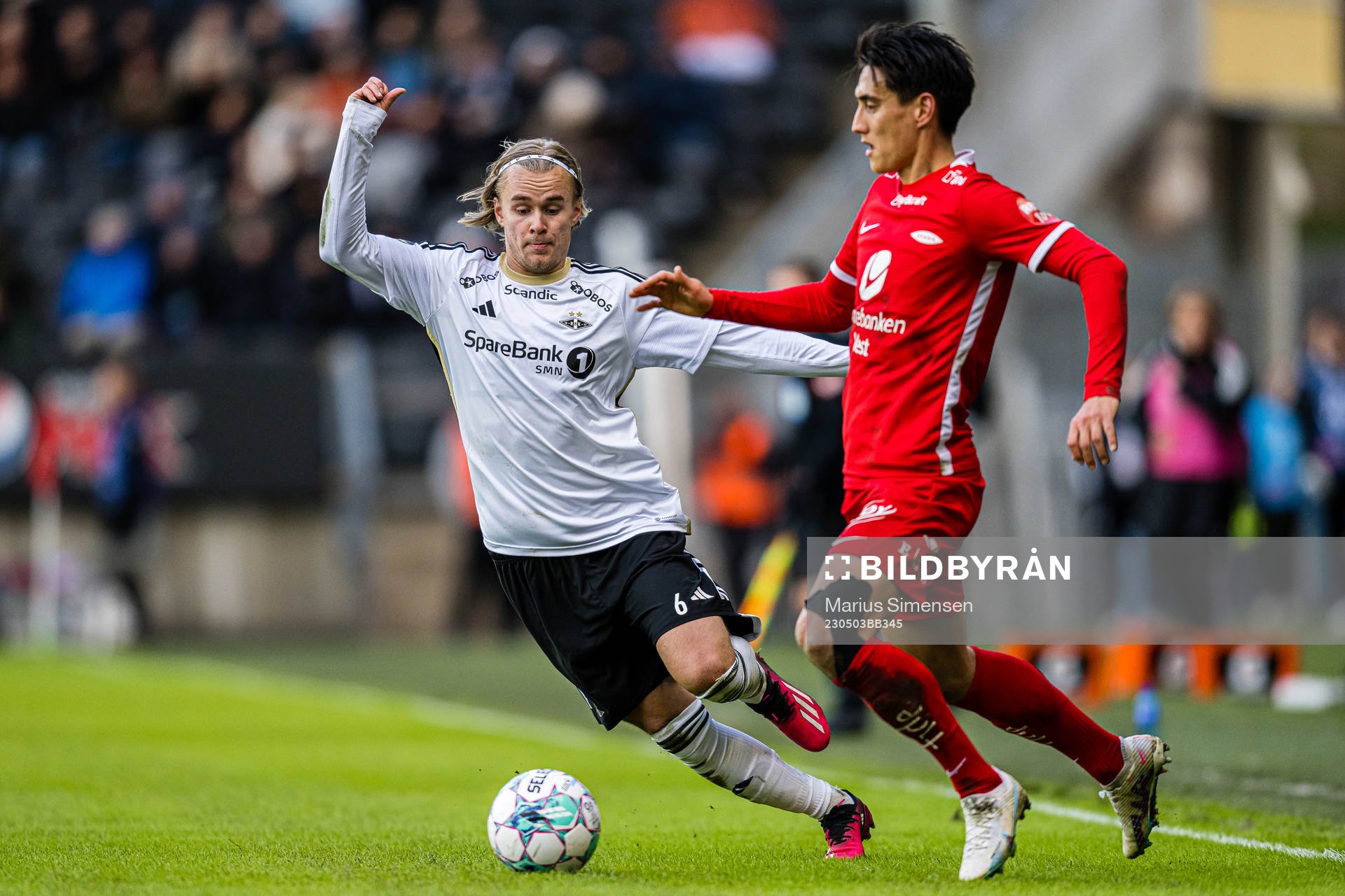 Santeri Leevi Oliver Väänänen of Rosenborg and Svenn Crone of Brann during the Eliteserien match between Rosenborg and Brann on May 3, 2023 in Trondheim.