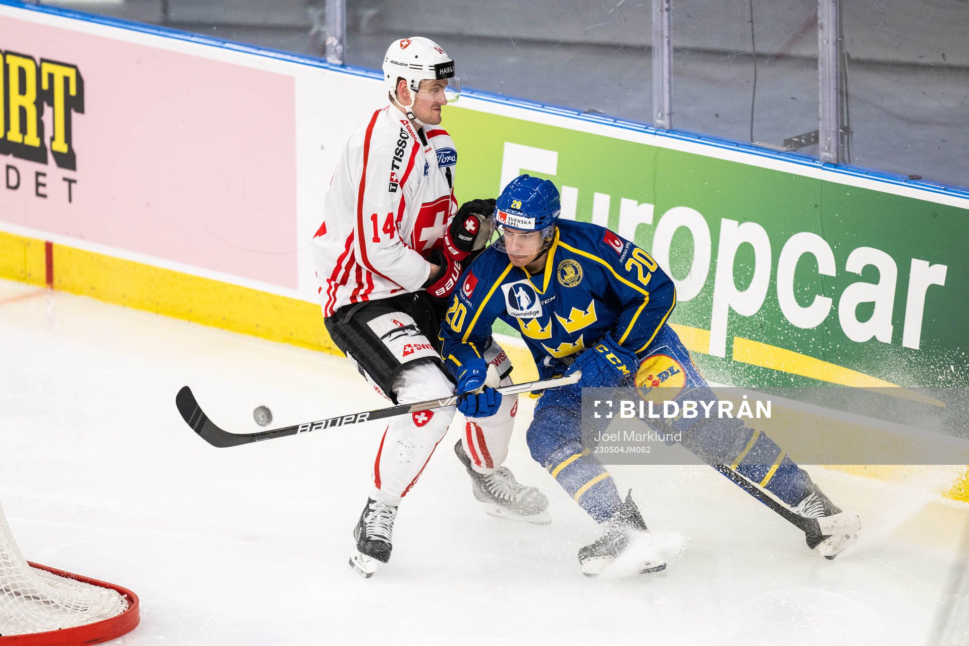 Dean Kukan of Switzerland and André Petersson of Sweden
