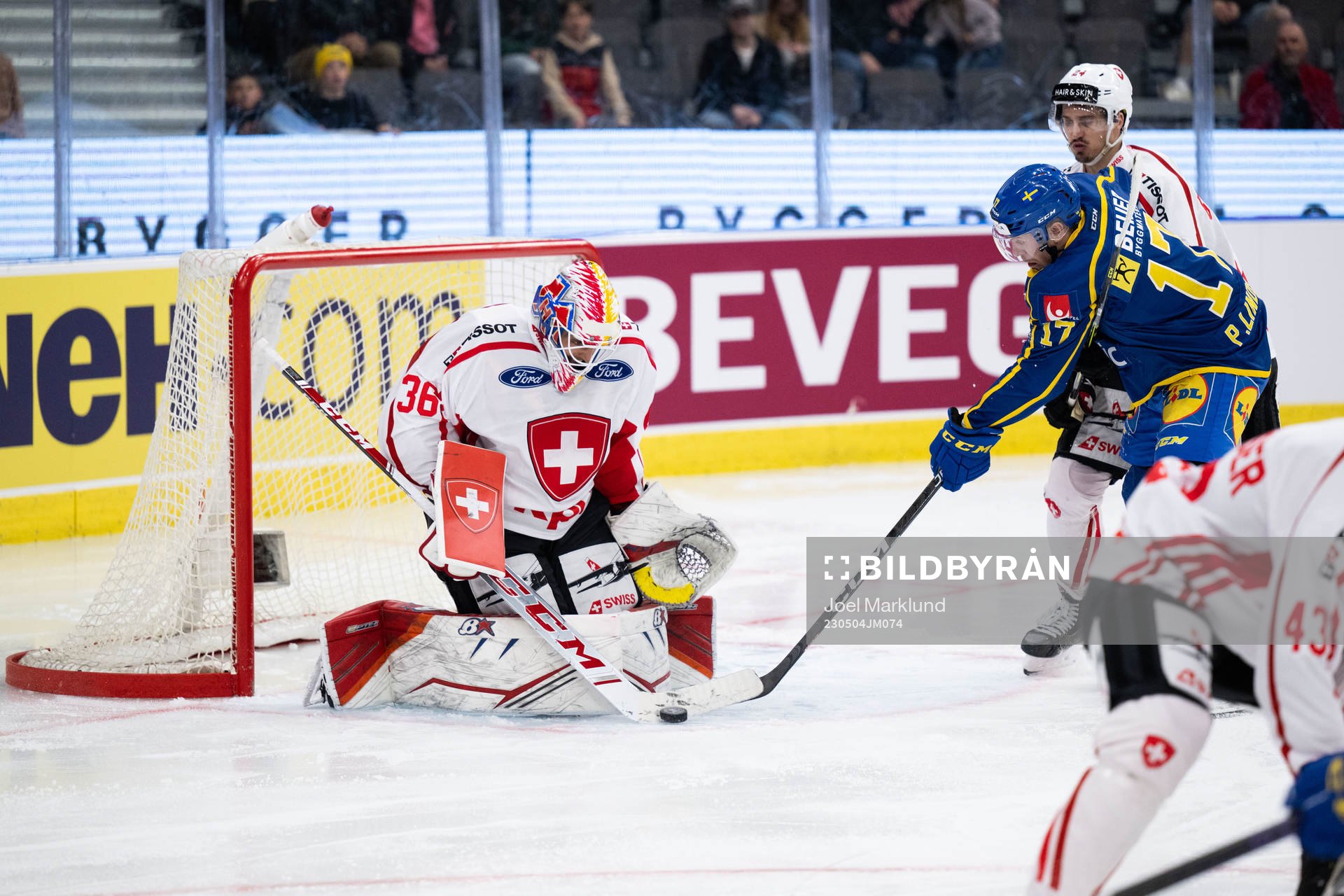 Goaltender Joren van Pottelberghe of Switzerland and Pär