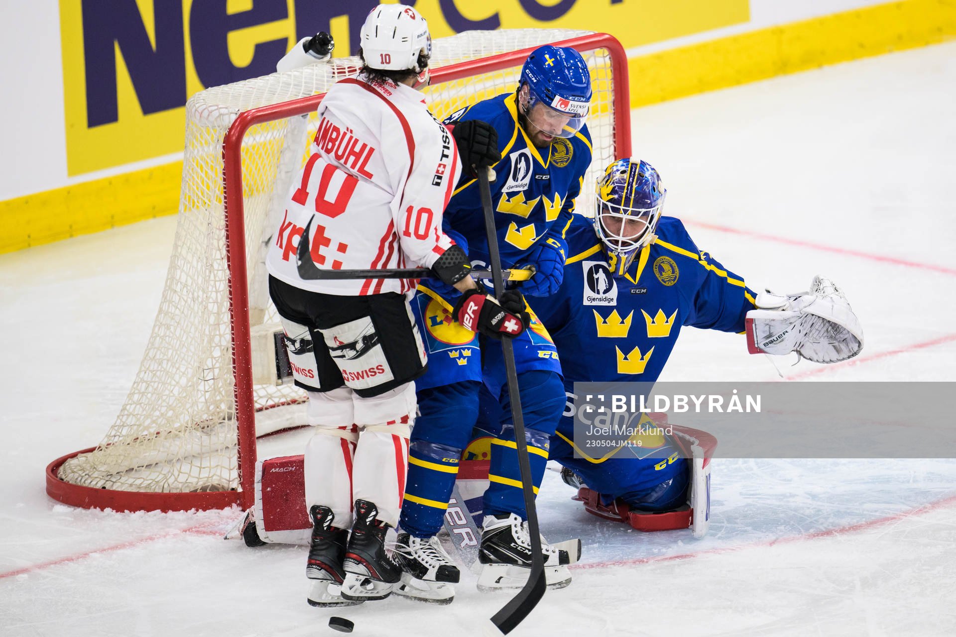 Andres Ambühl of Switzerland challenges Lukas Bengtsson