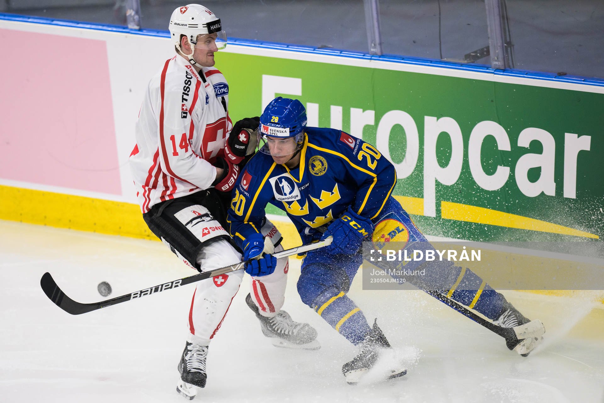 Dean Kukan of Switzerland and André Petersson of Sweden