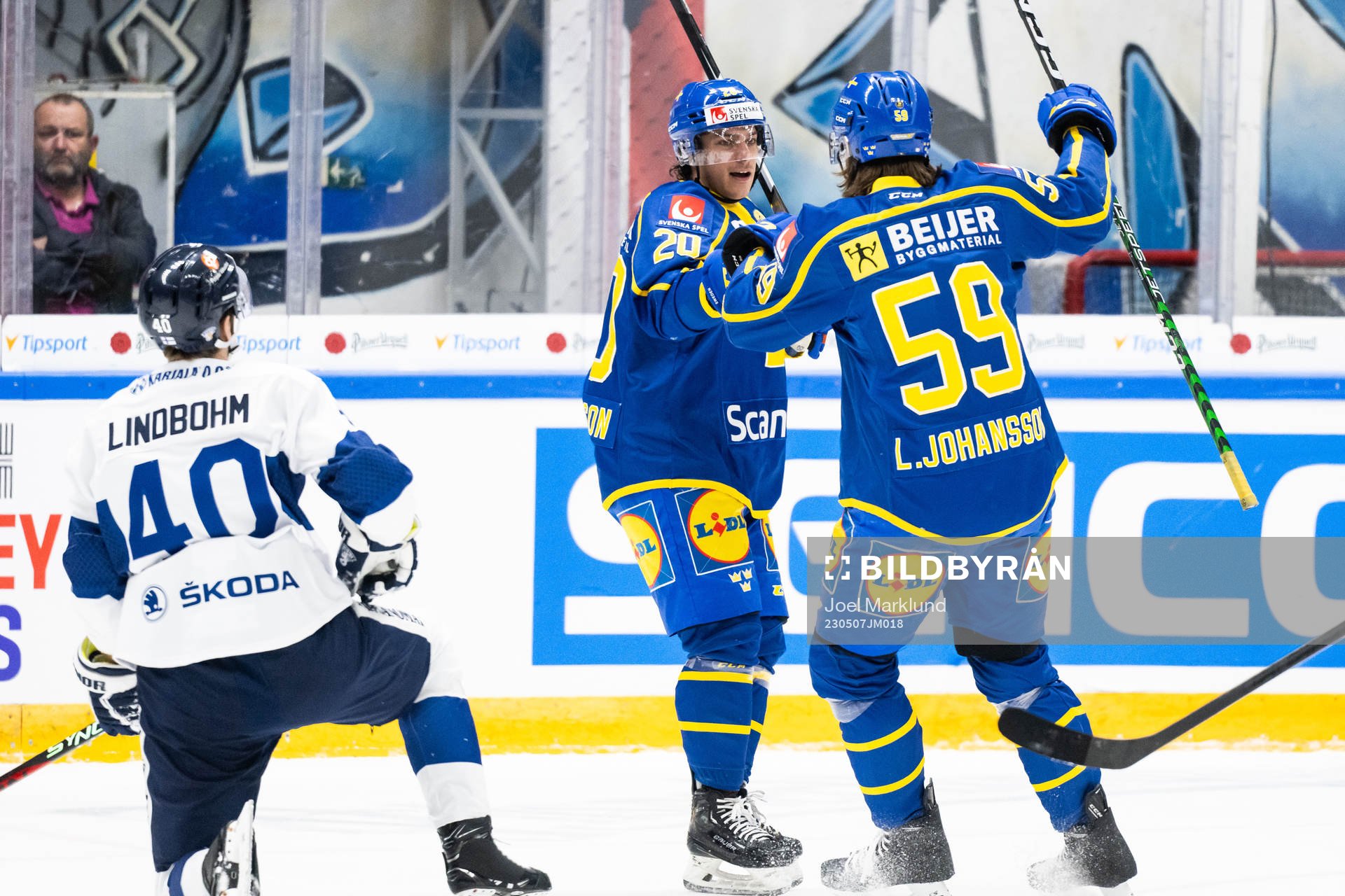 André Petersson and Linus Johansson of Sweden celebrate
