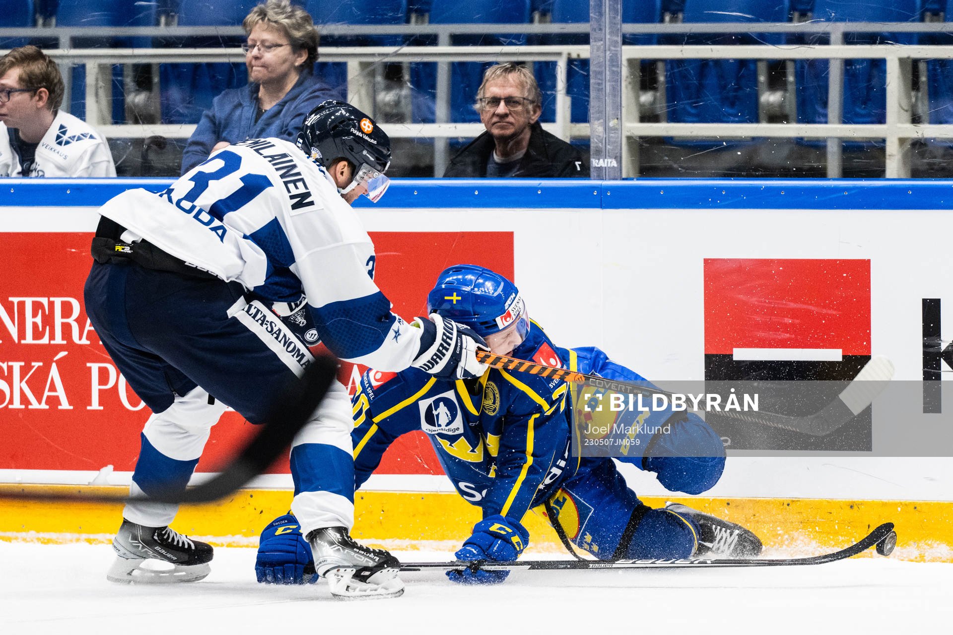 Valtteri Kemiläinen of Finland and Dennis Rasmussen of