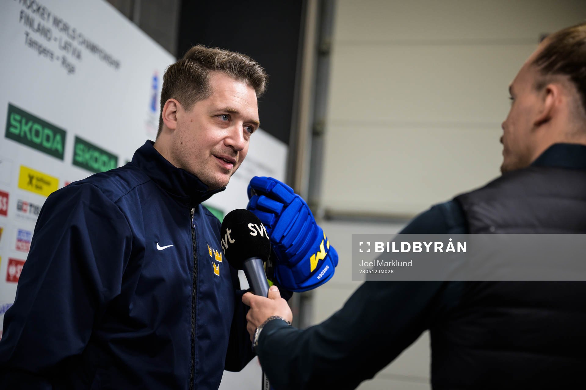 Head coach Sam Hallam of Sweden is being interviewed by SVT