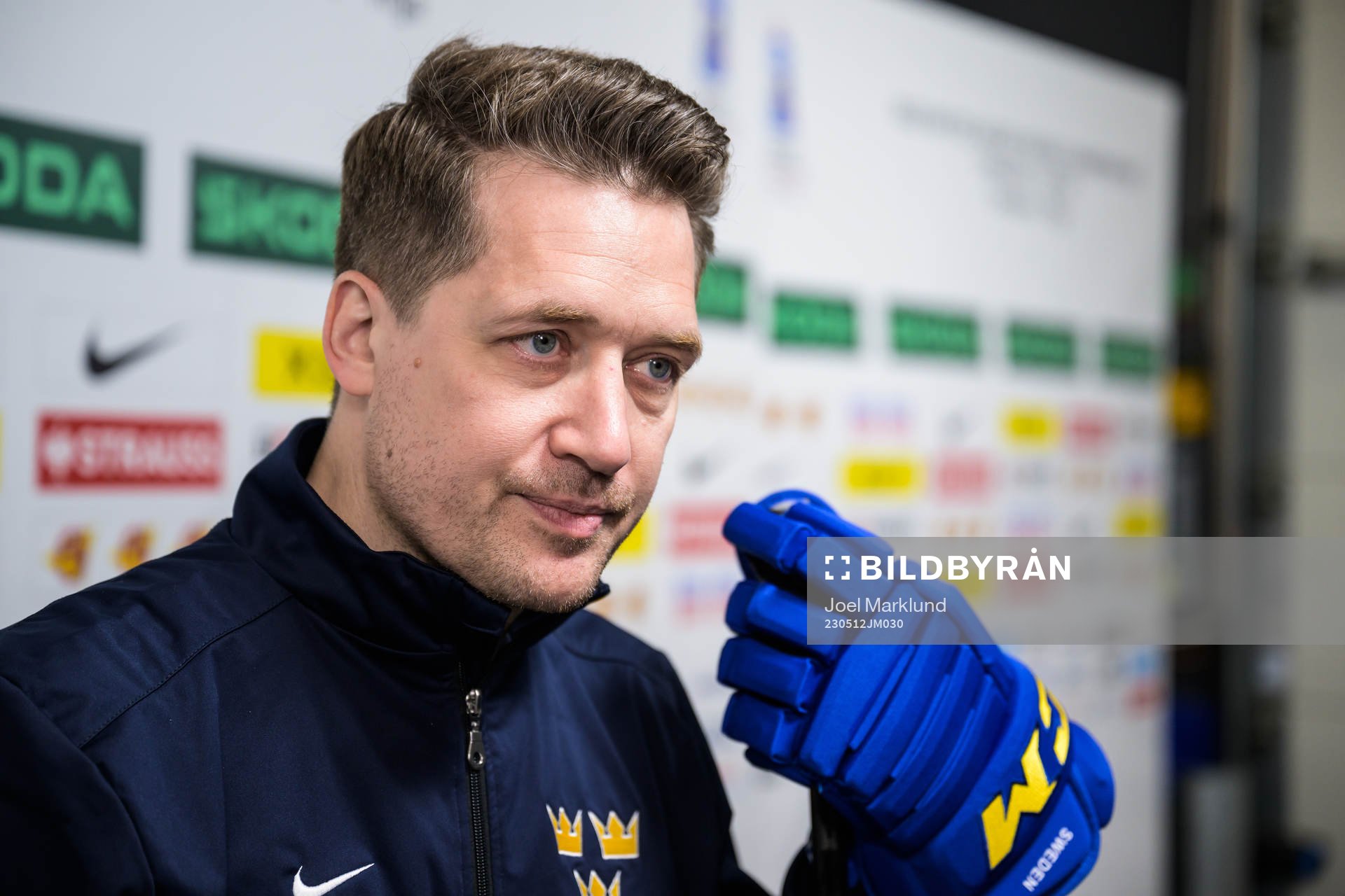 Head coach Sam Hallam of Sweden is being interviewed