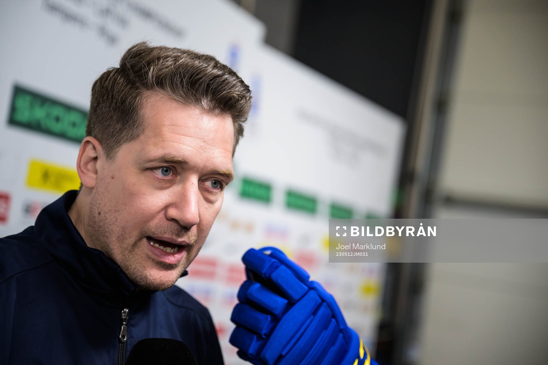 Head coach Sam Hallam of Sweden is being interviewed