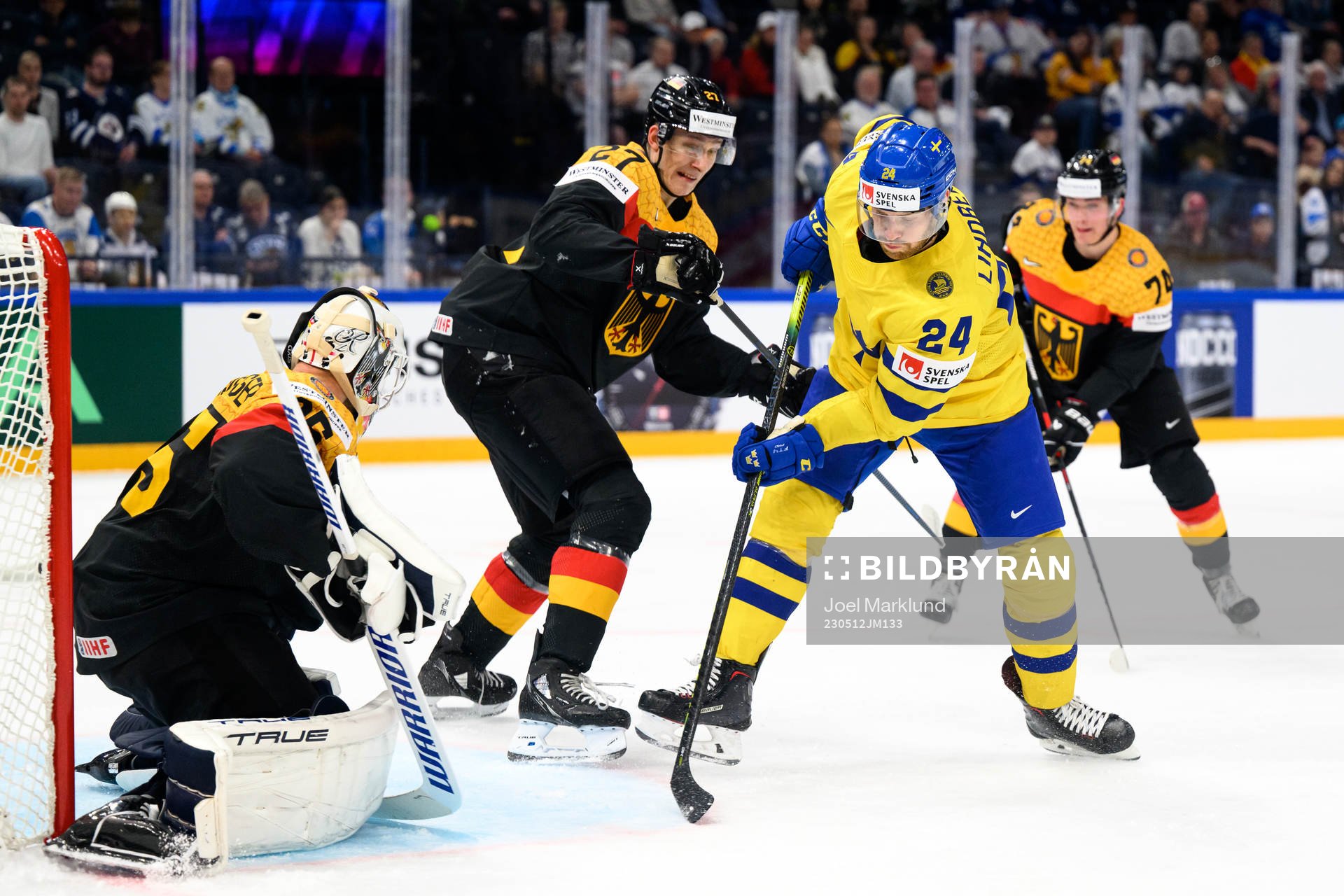 Goaltender Mathias Niederberger and Maksymilian Szuber of
