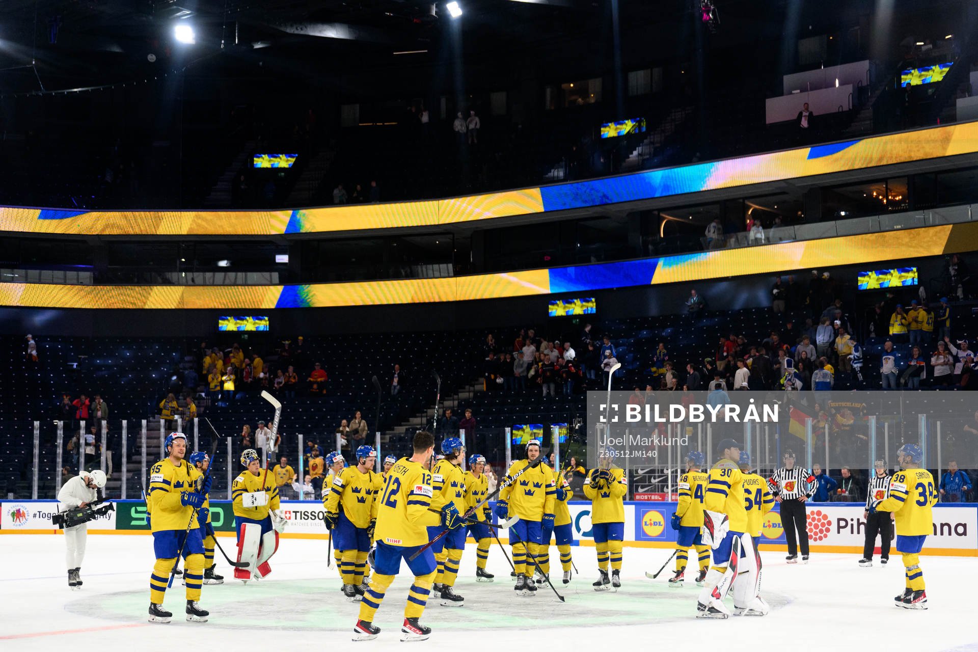 The Swedish players celebrate