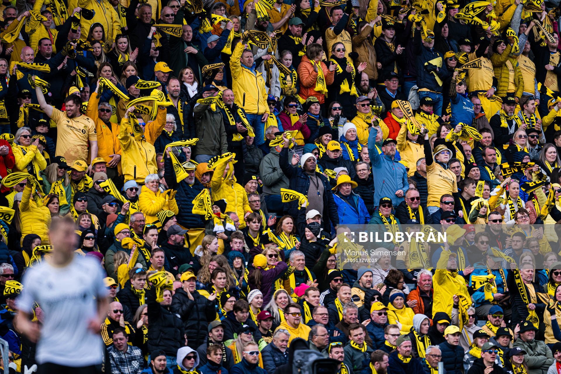 Spectators in the stands at Aspmyra Stadion during the Eliteserien match between Bodø/Glimt and Rosenborg on May 13, 2023 in Bodø.