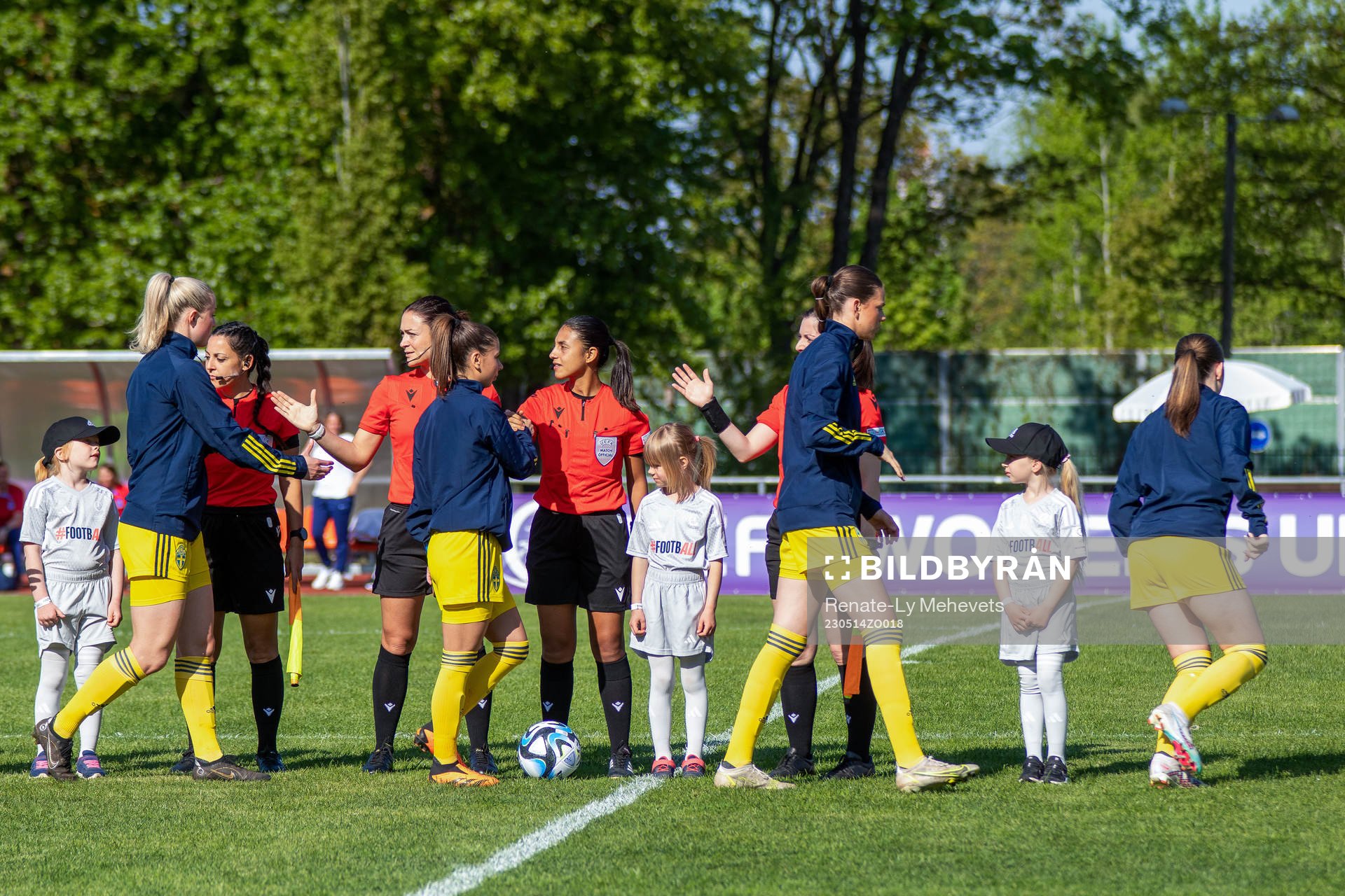 Players of Sweden greet the referees