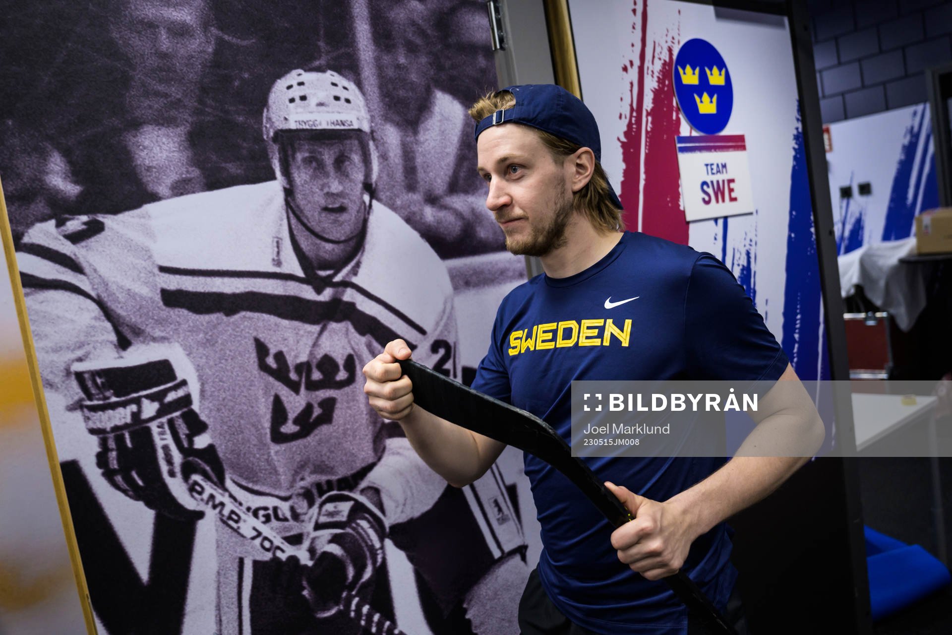 Jonathan Pudas of Sweden walks by a picture of Börje