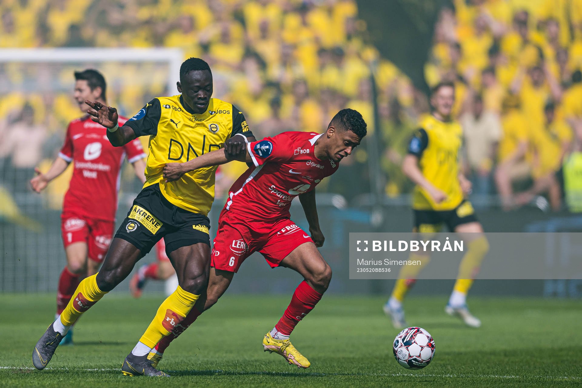 Akor Adams of Lillestrøm and Japhet Sery Larsen of Brann