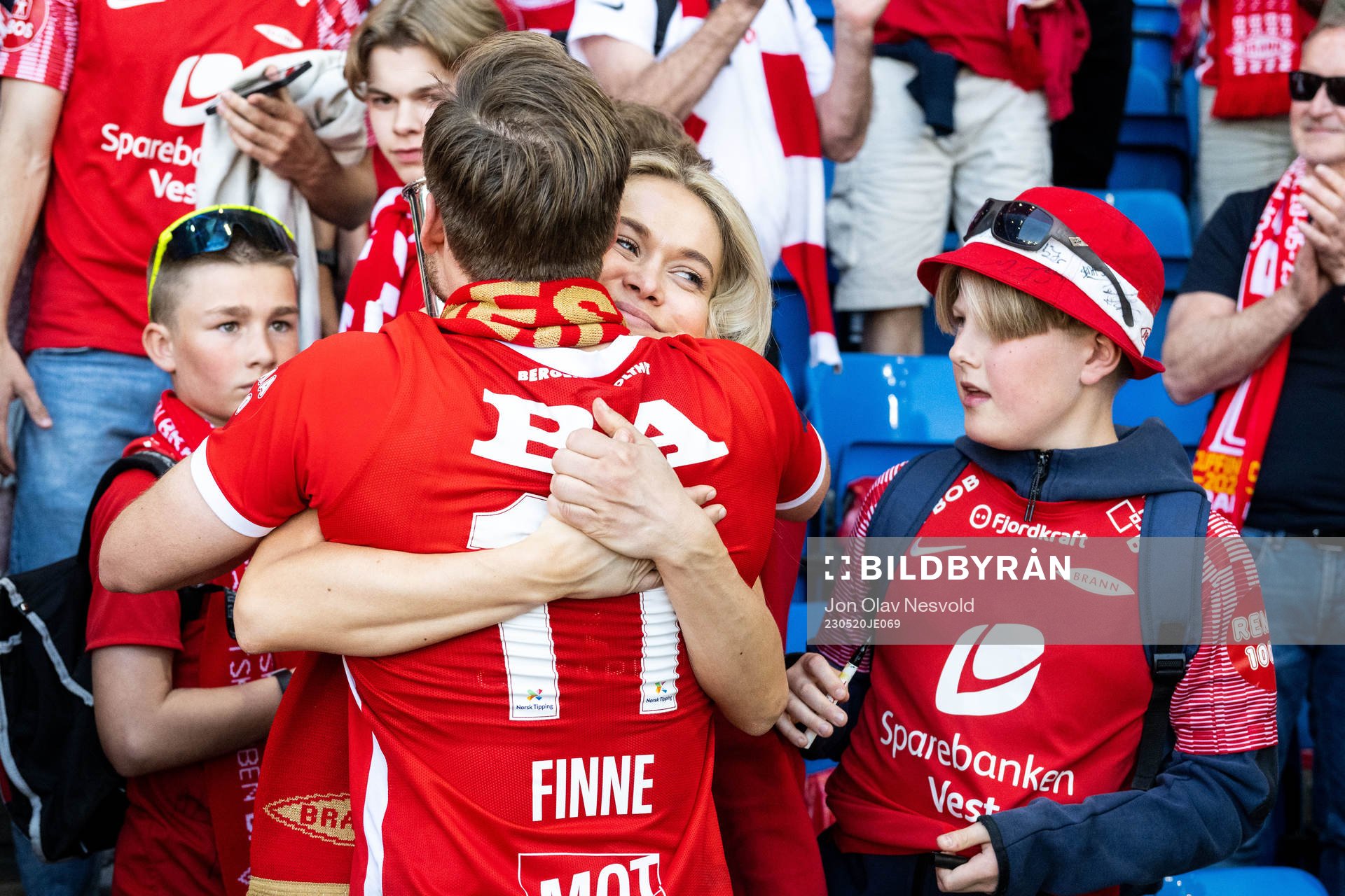 Bård Finne of Brann celebrates with fan