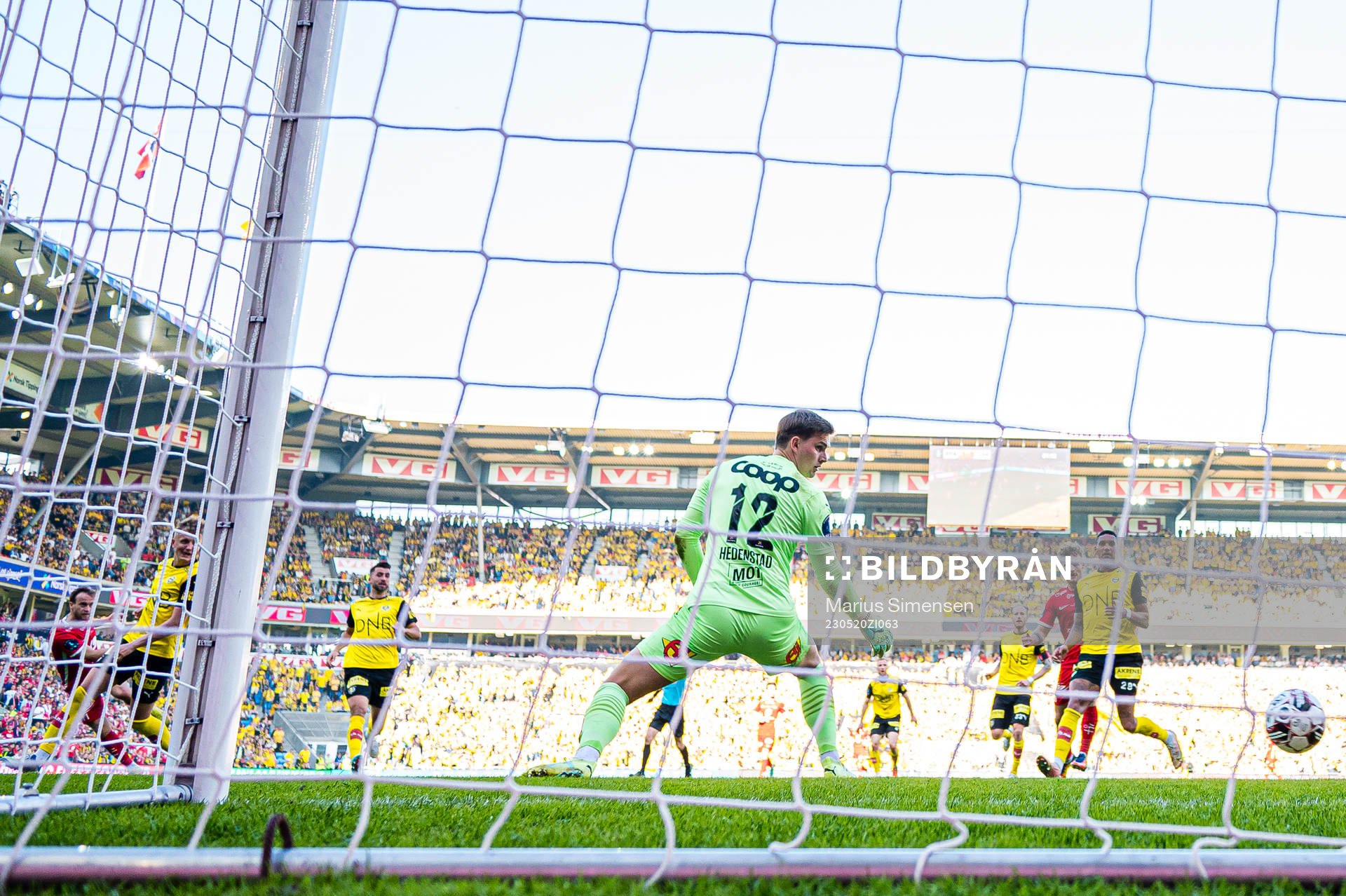 Bård Finne of Brann scores the 2-0 goal behind Mads