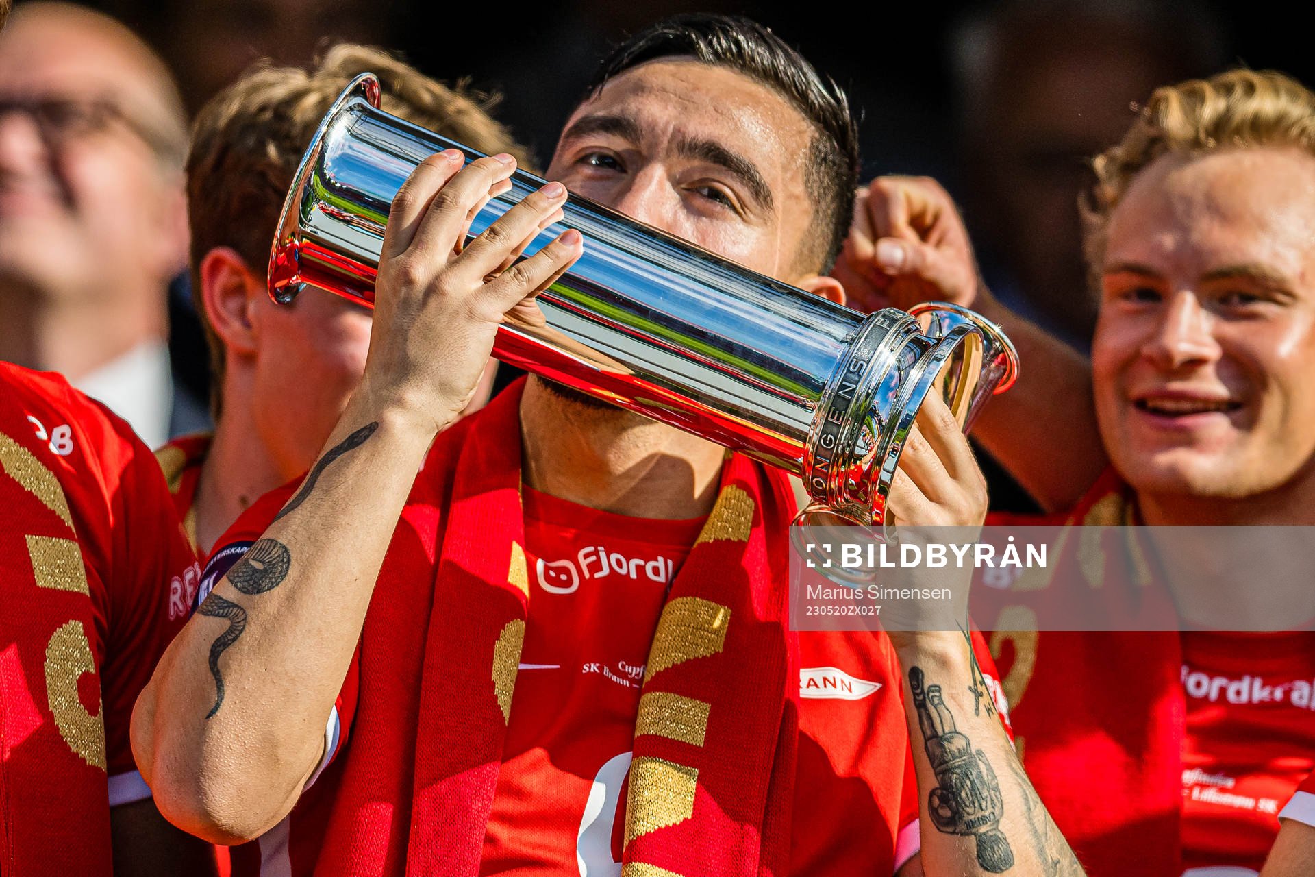 Niklas Castro of Brann celebrates with the trophy