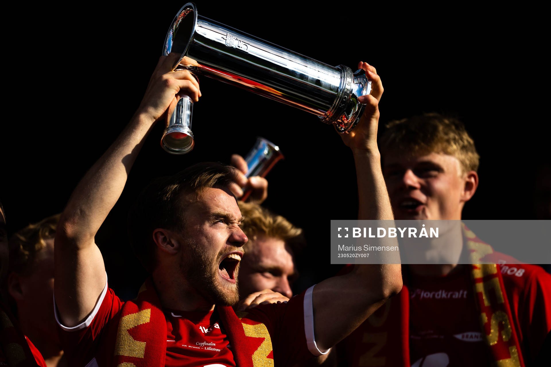 Bård Finne of Brann celebrates with the trophy