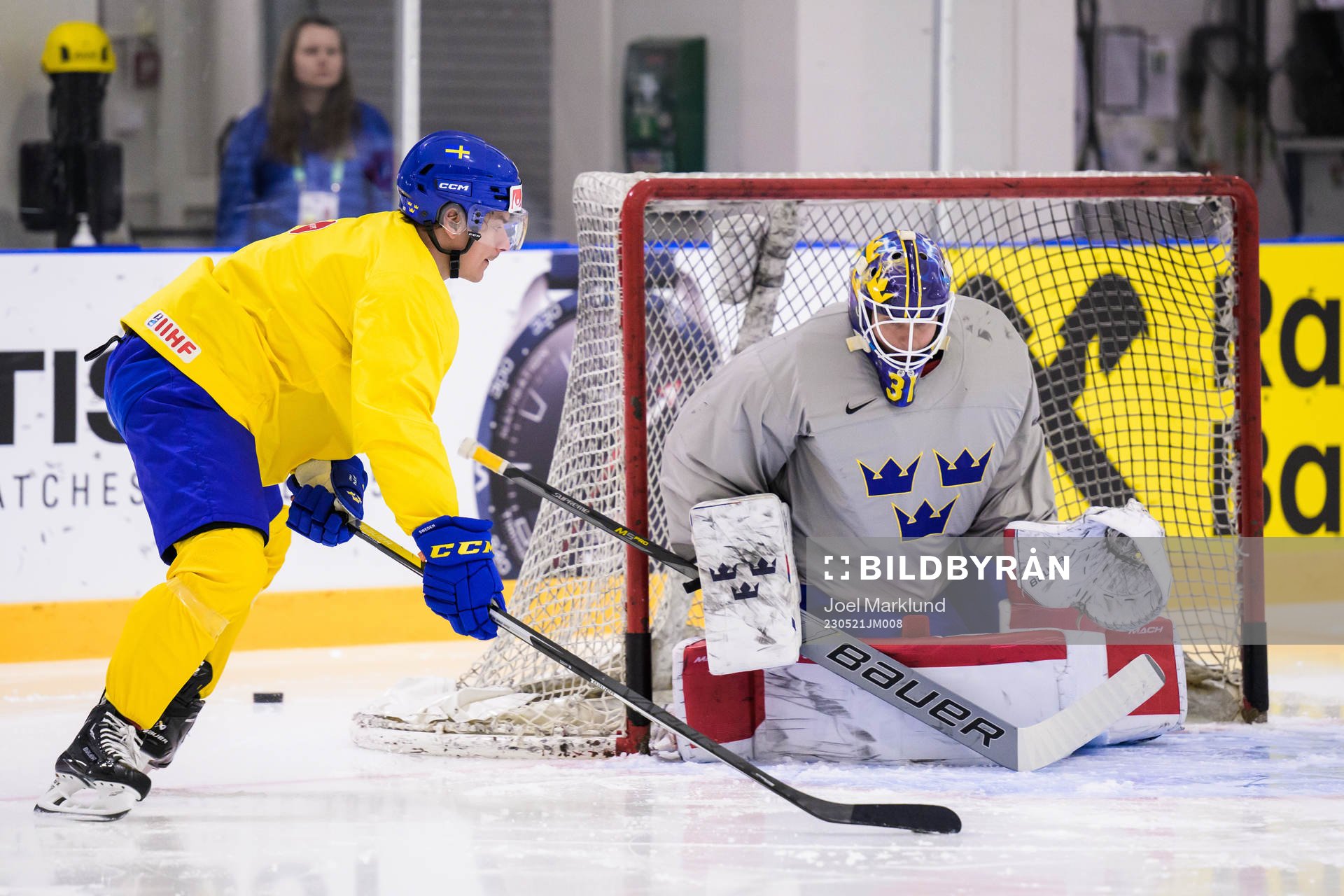 André Petersson and goaltender Lars Johansson of Sweden at