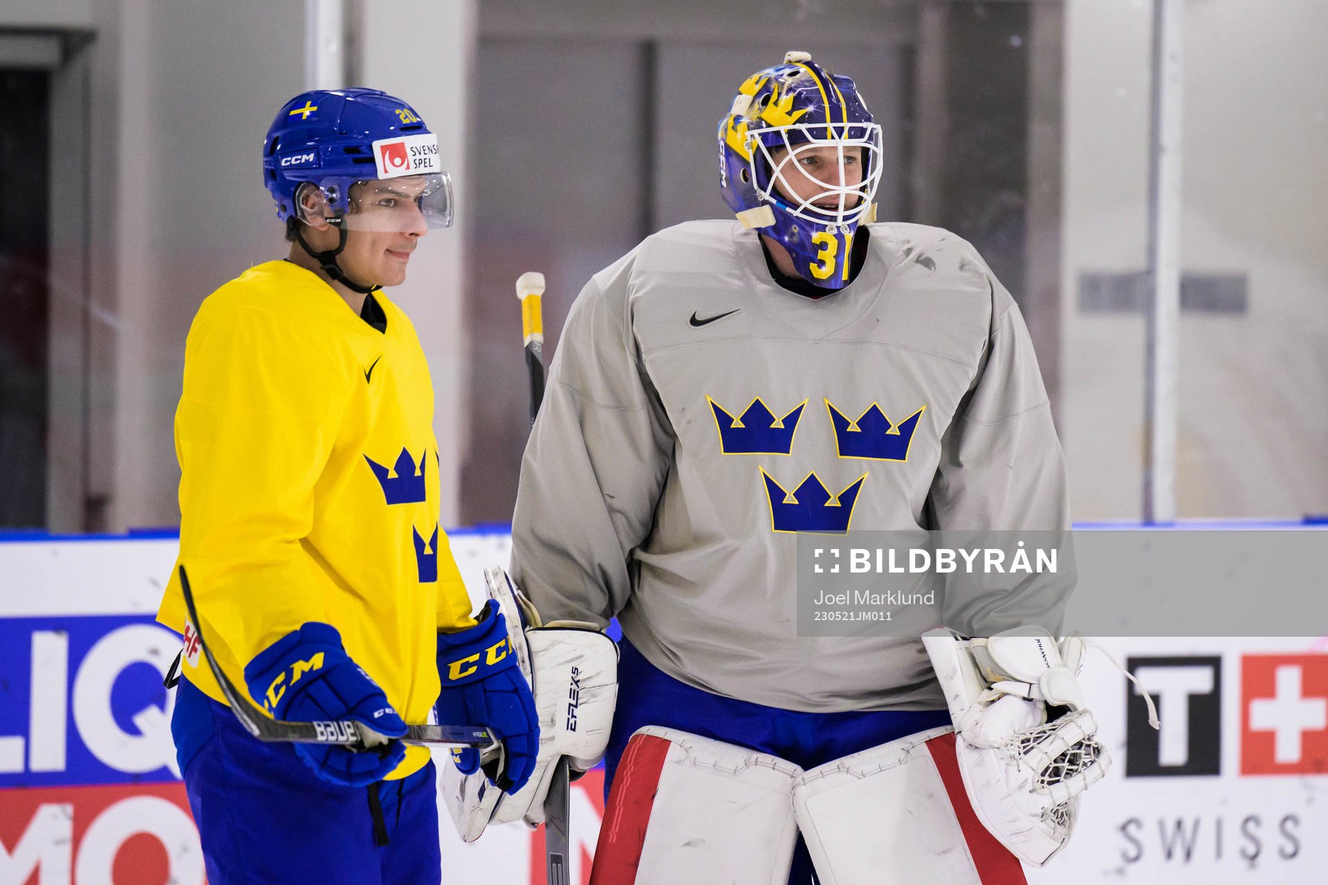 André Petersson and goaltender Lars Johansson of Sweden at