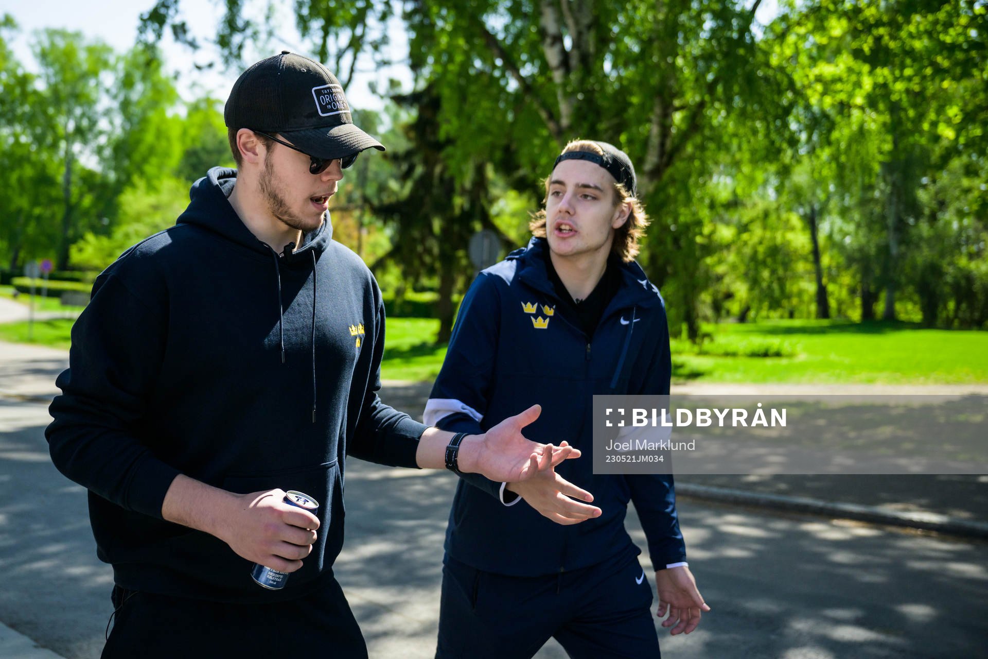 Goaltender Jesper Wallstedt and Leo Carlsson of Sweden walk