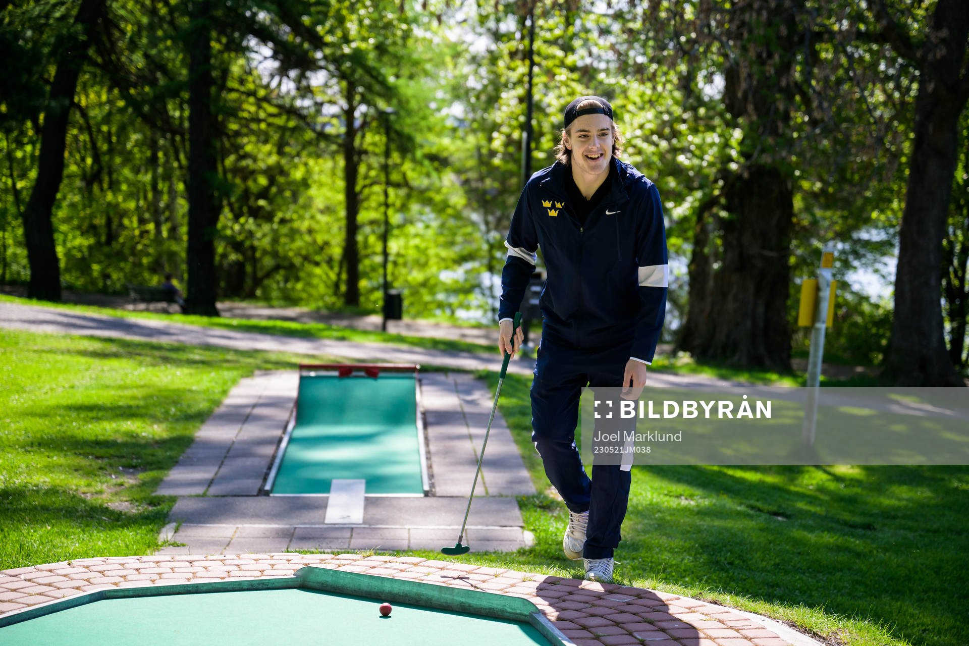 Leo Carlsson of Sweden plays minigolf