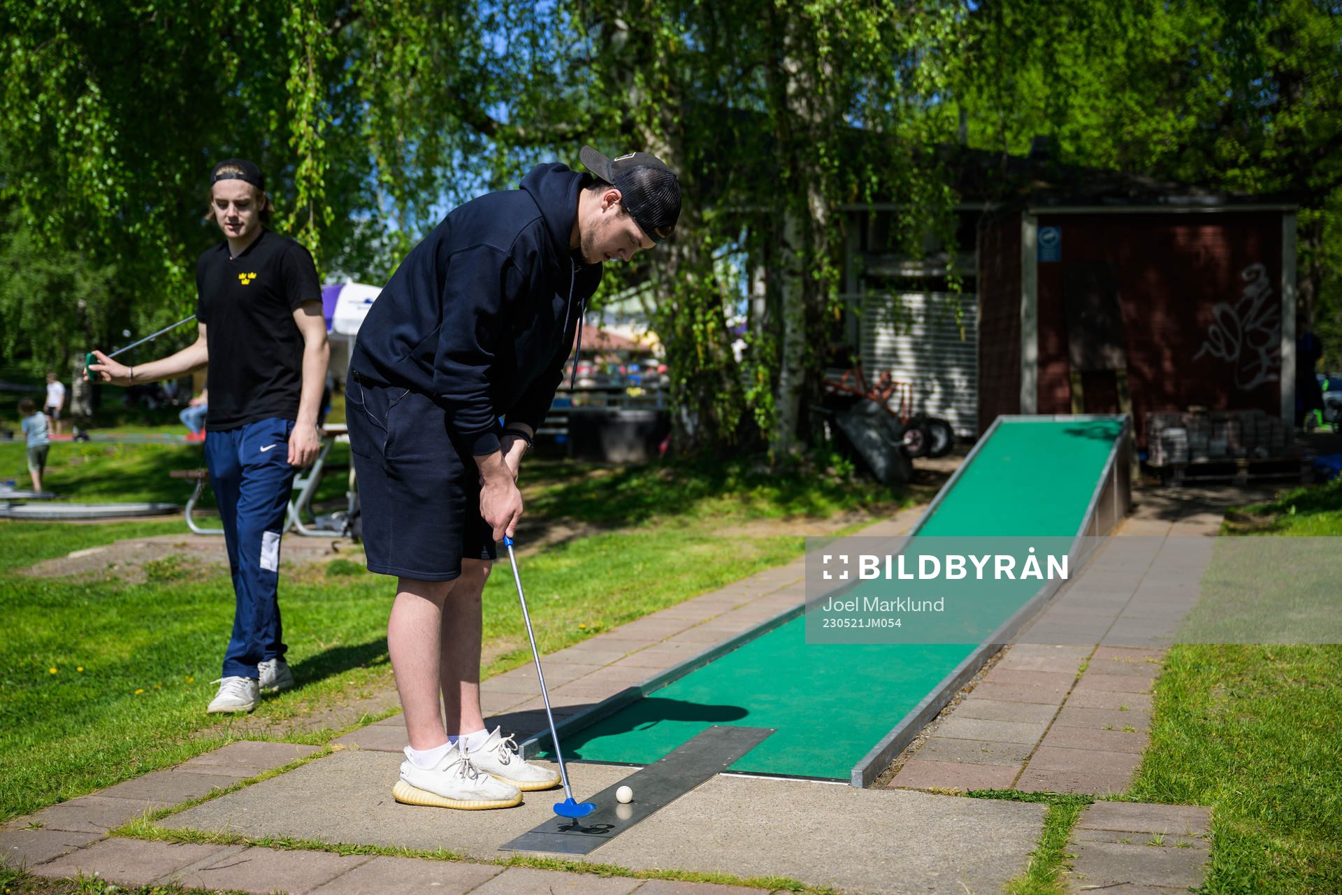 Leo Carlsson and goaltender Jesper Wallstedt of Sweden play