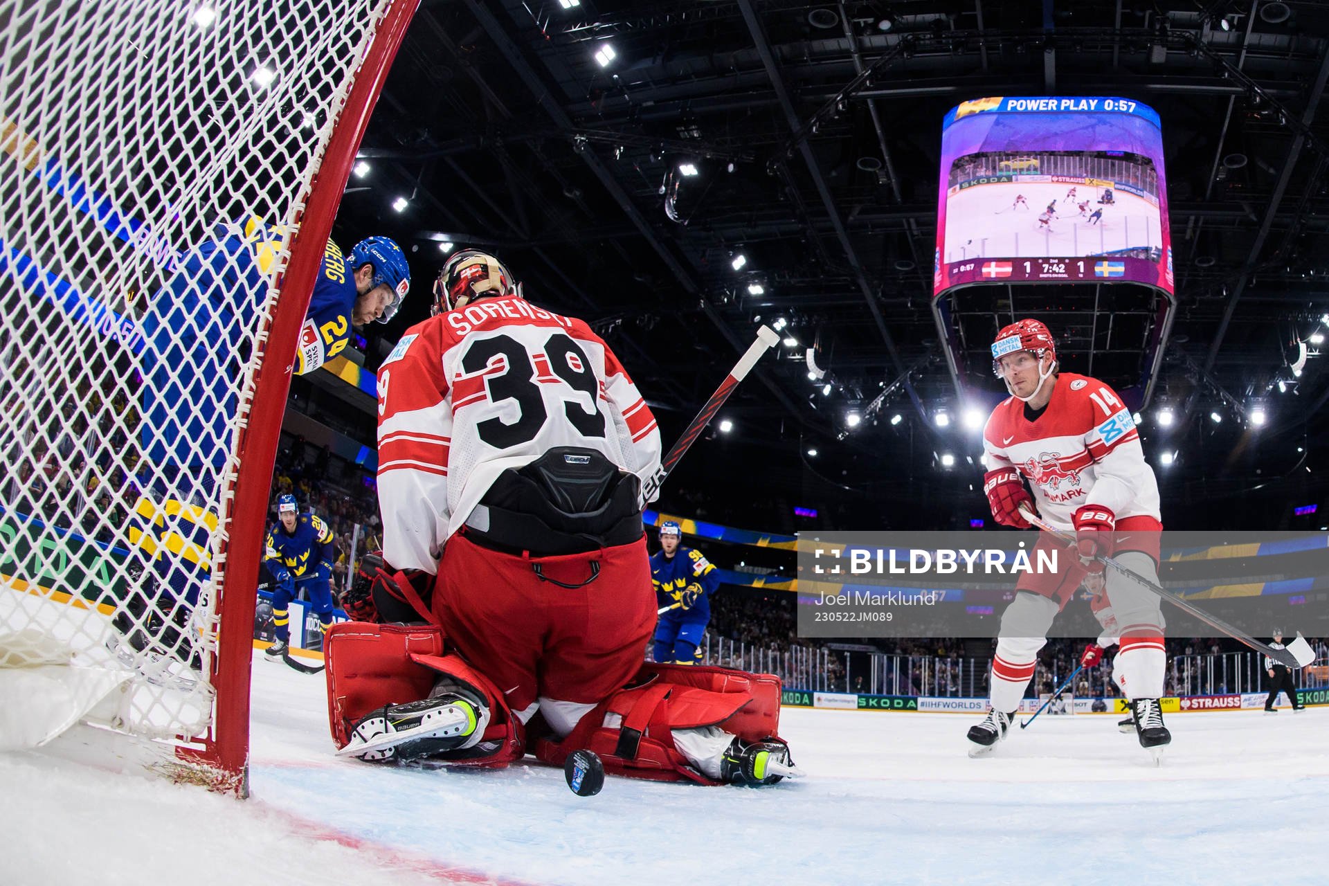 André Petersson of Sweden scores 1-2 behind goaltender