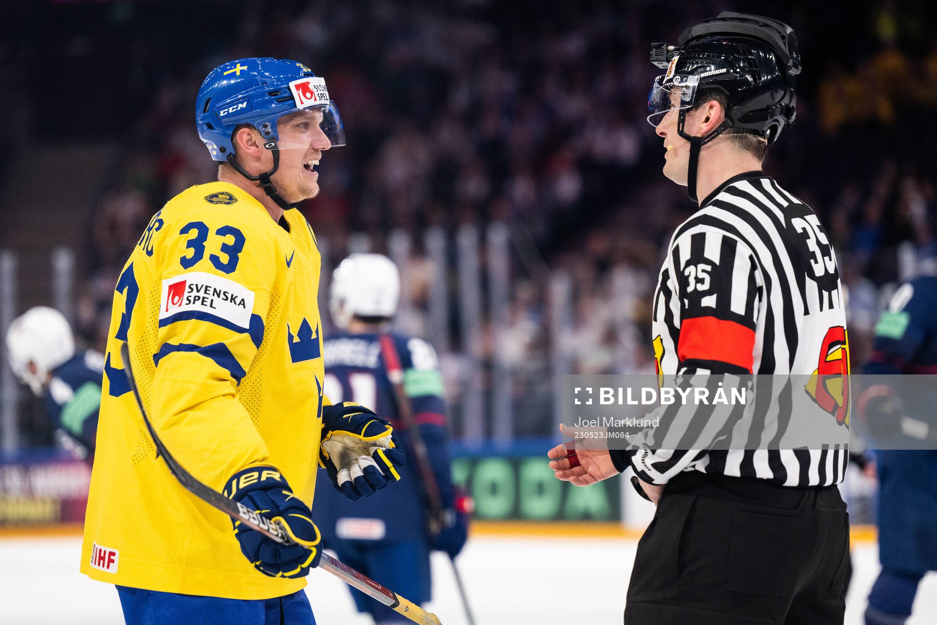 Jakob Silfverberg of Sweden reacts to linesman Andre
