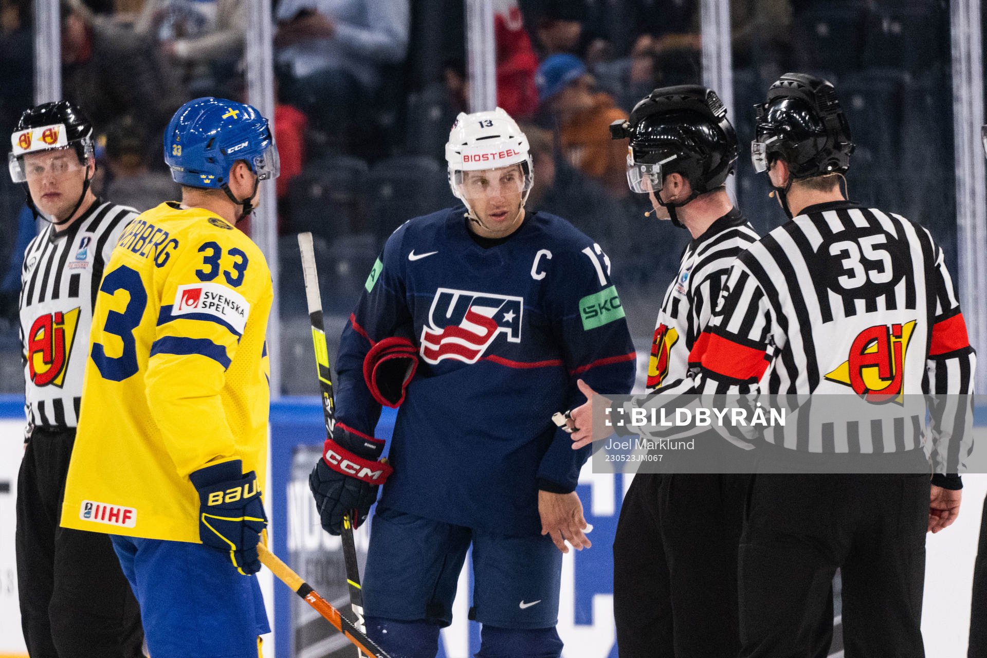 Jakob Silfverberg of Sweden and Nick Bonino of USA talks to