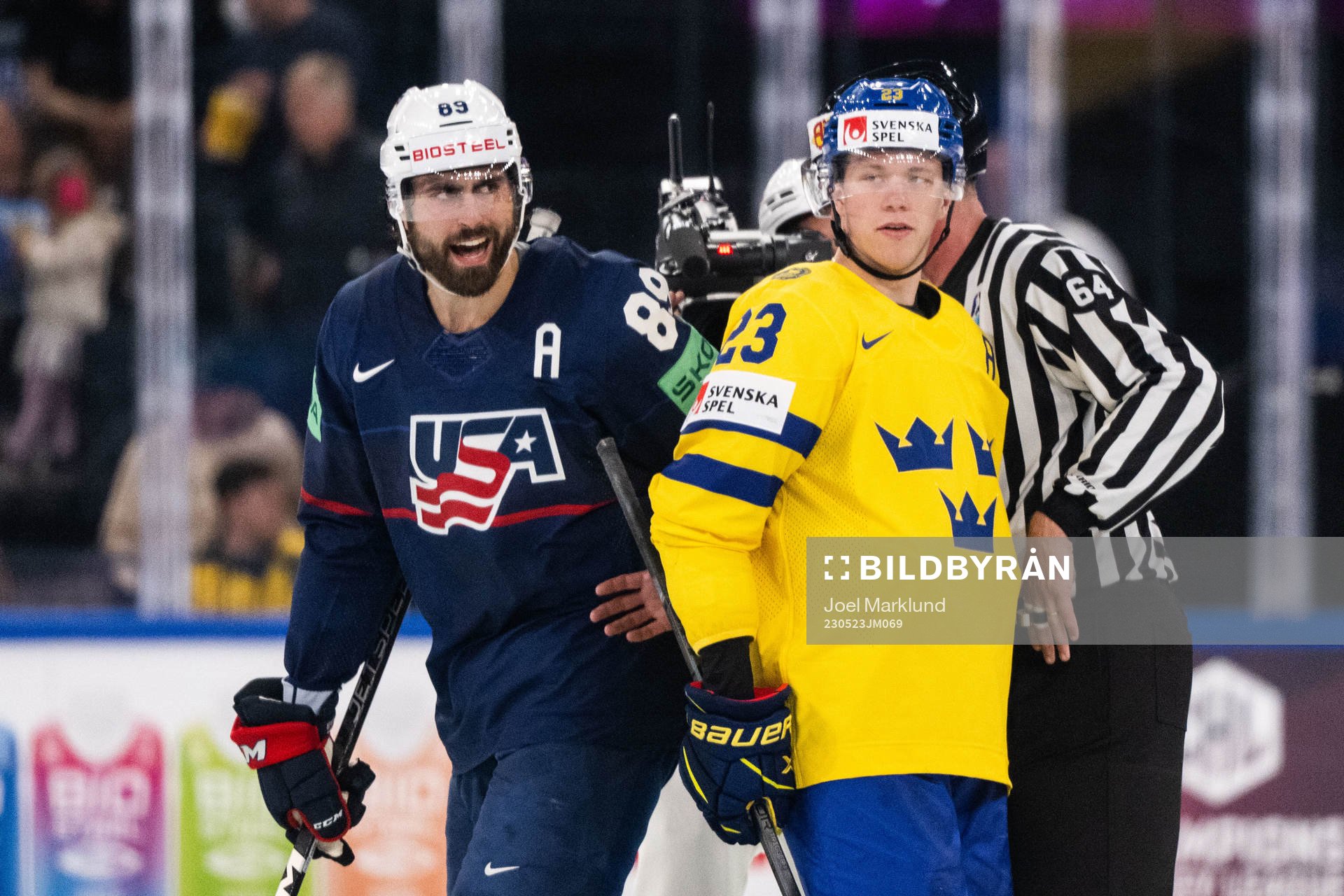 Alex Tuch of USA and Lucas Raymond of Sweden